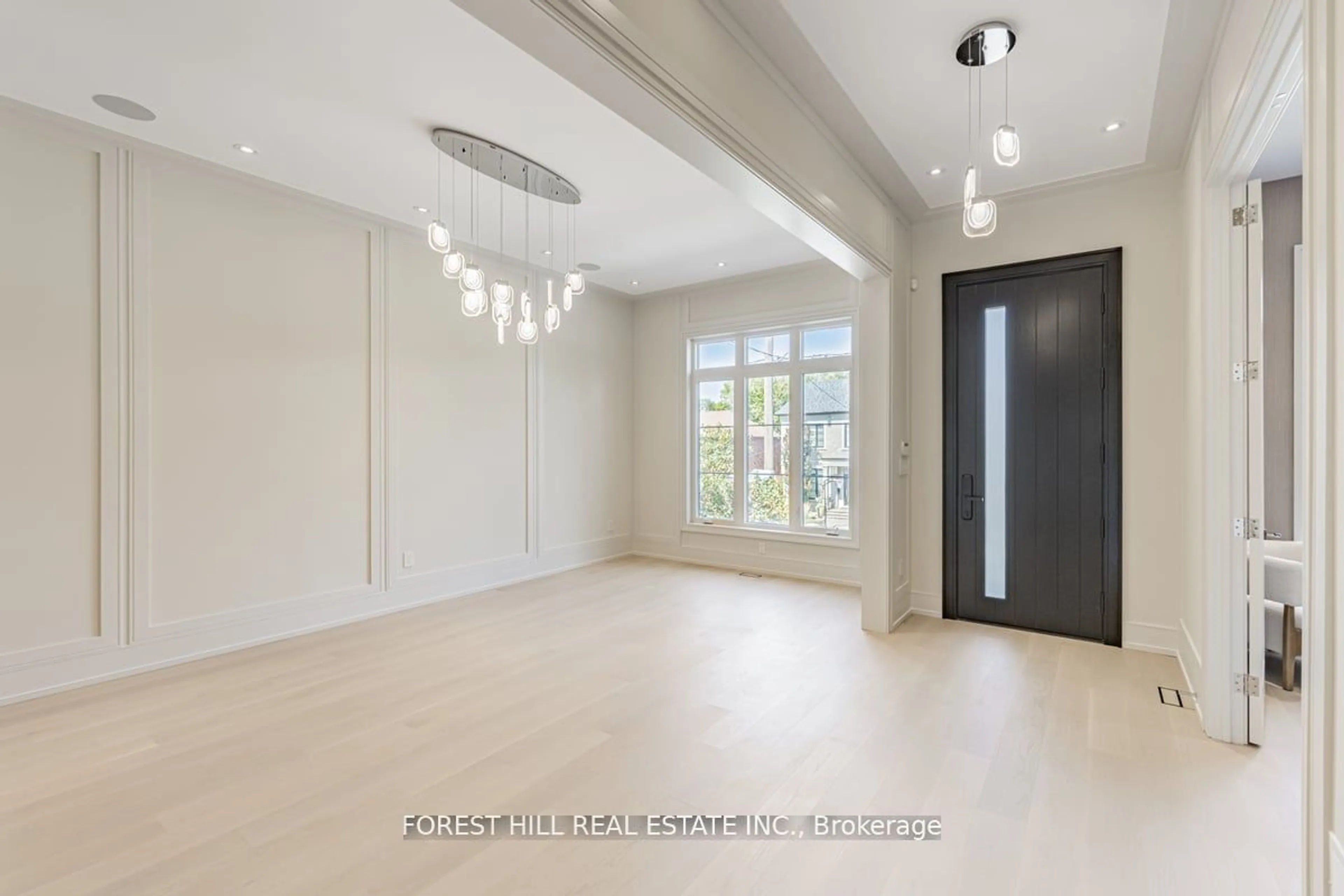 Indoor foyer, wood floors for 115 Dewbourne Ave, Toronto Ontario M6C 1Y6