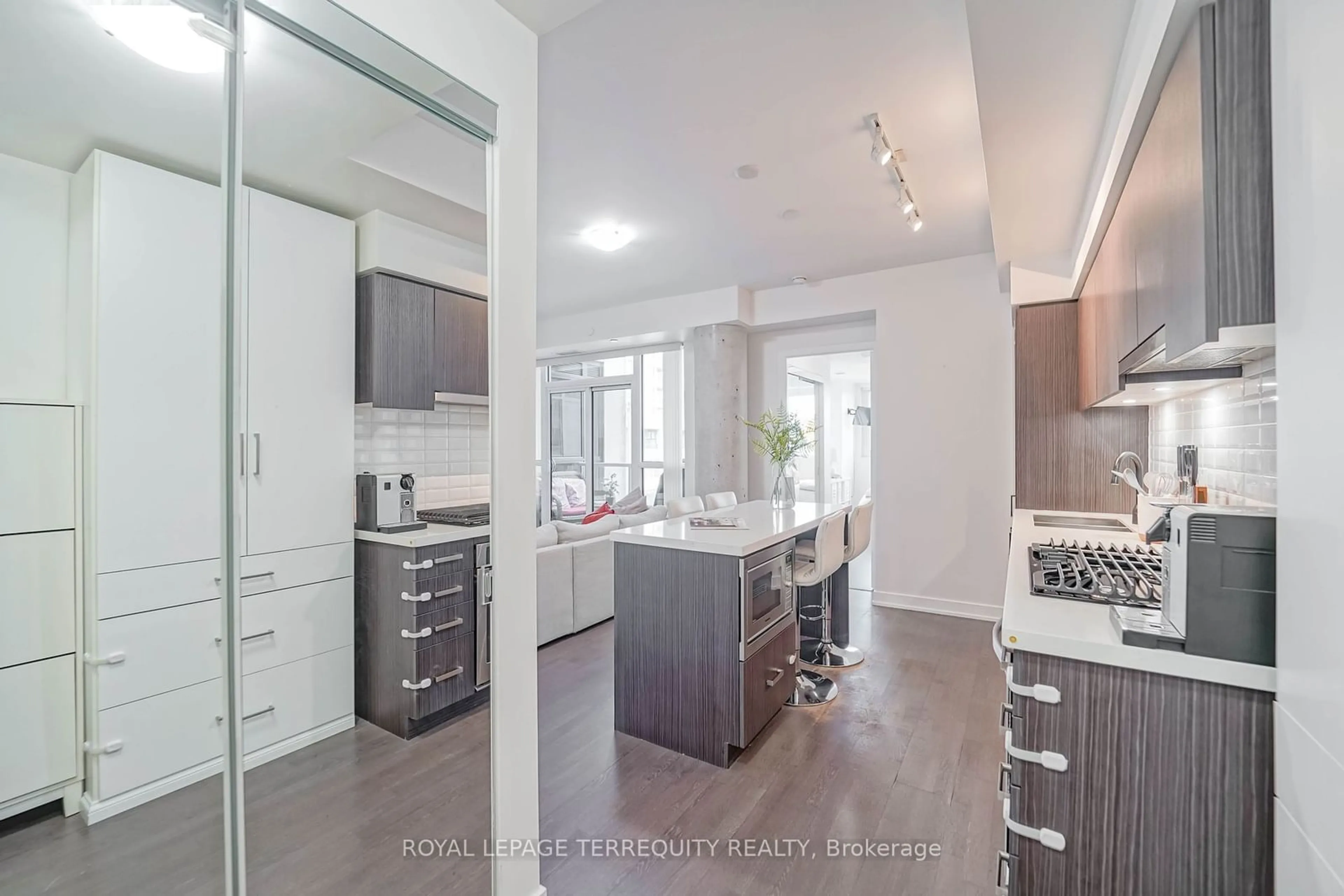 Open concept kitchen for 501 St. Clair Ave #301, Toronto Ontario M5P 0A2