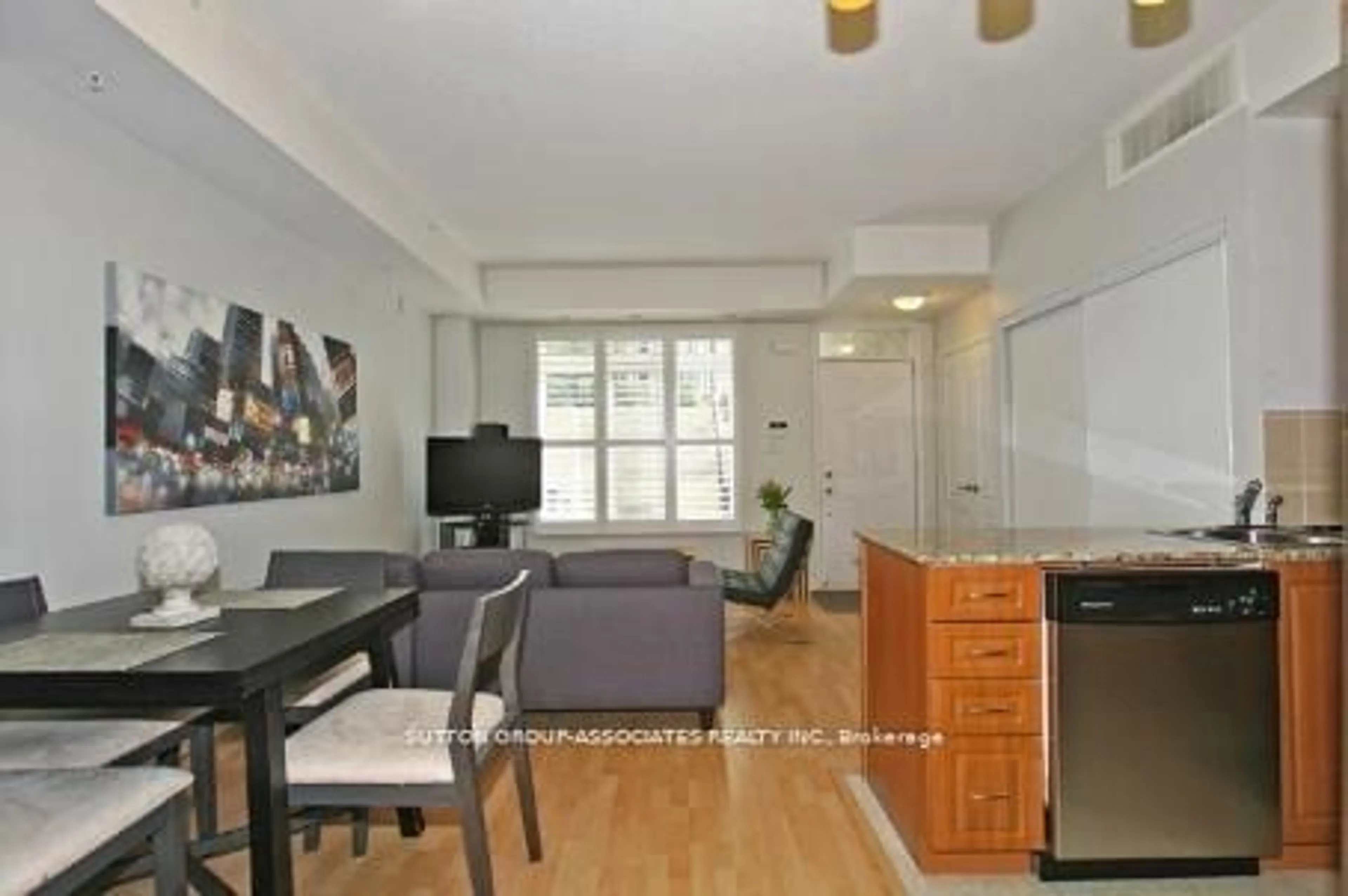 Living room, wood floors for 88 Carr St #TH19, Toronto Ontario M5T 1B7