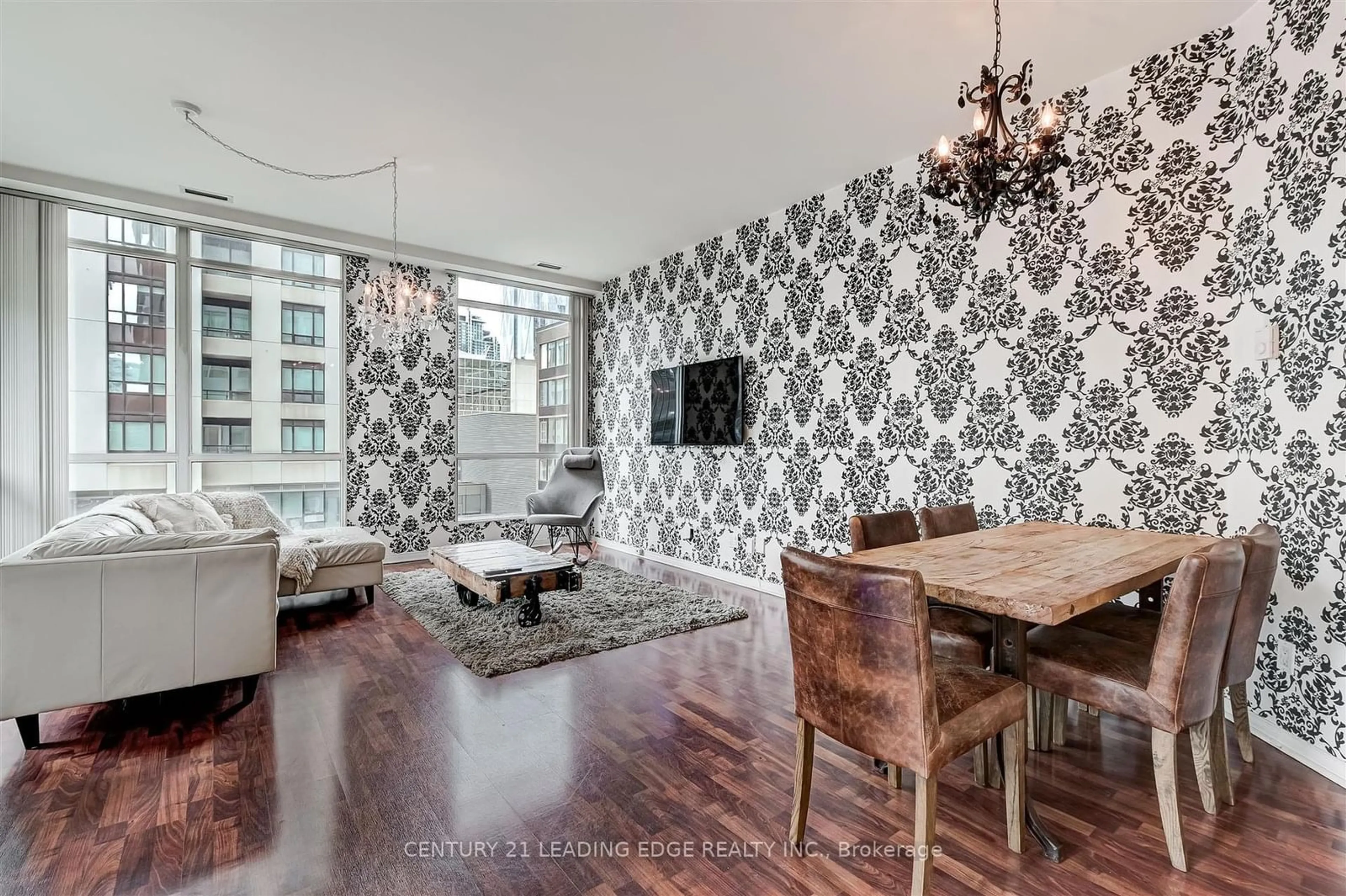 Dining room, wood floors, the street view for 7 King St #903, Toronto Ontario M5C 3C5