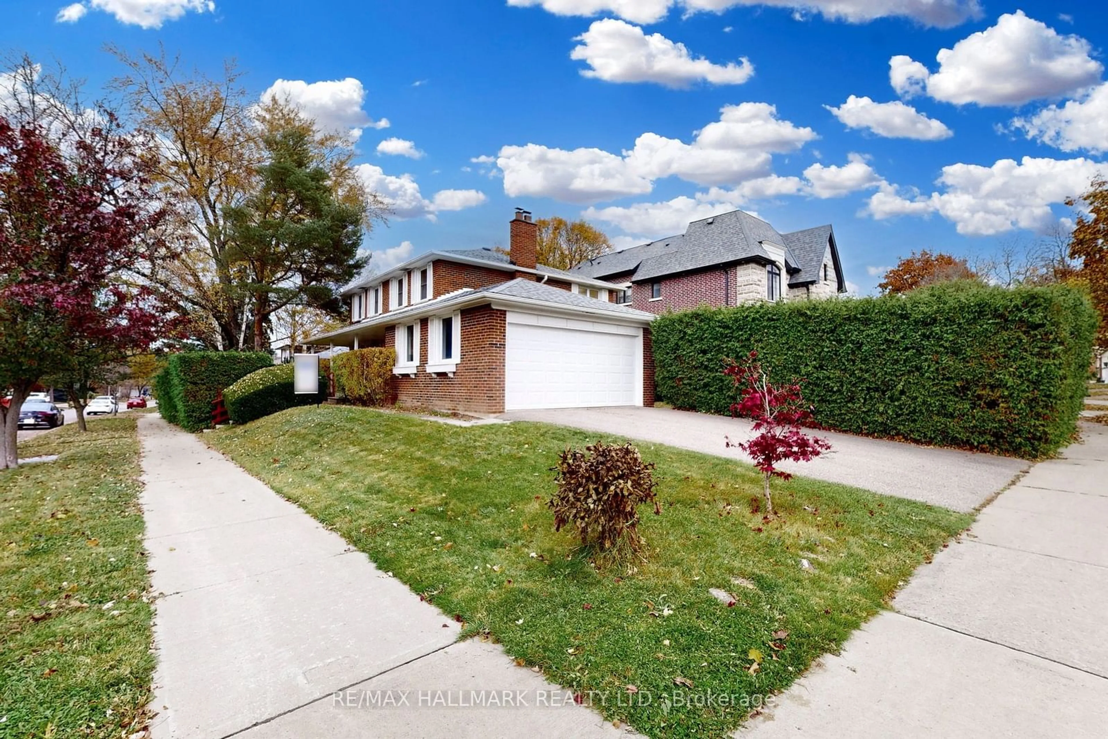 Frontside or backside of a home, the street view for 129 Clansman Blvd, Toronto Ontario M2H 1Y3