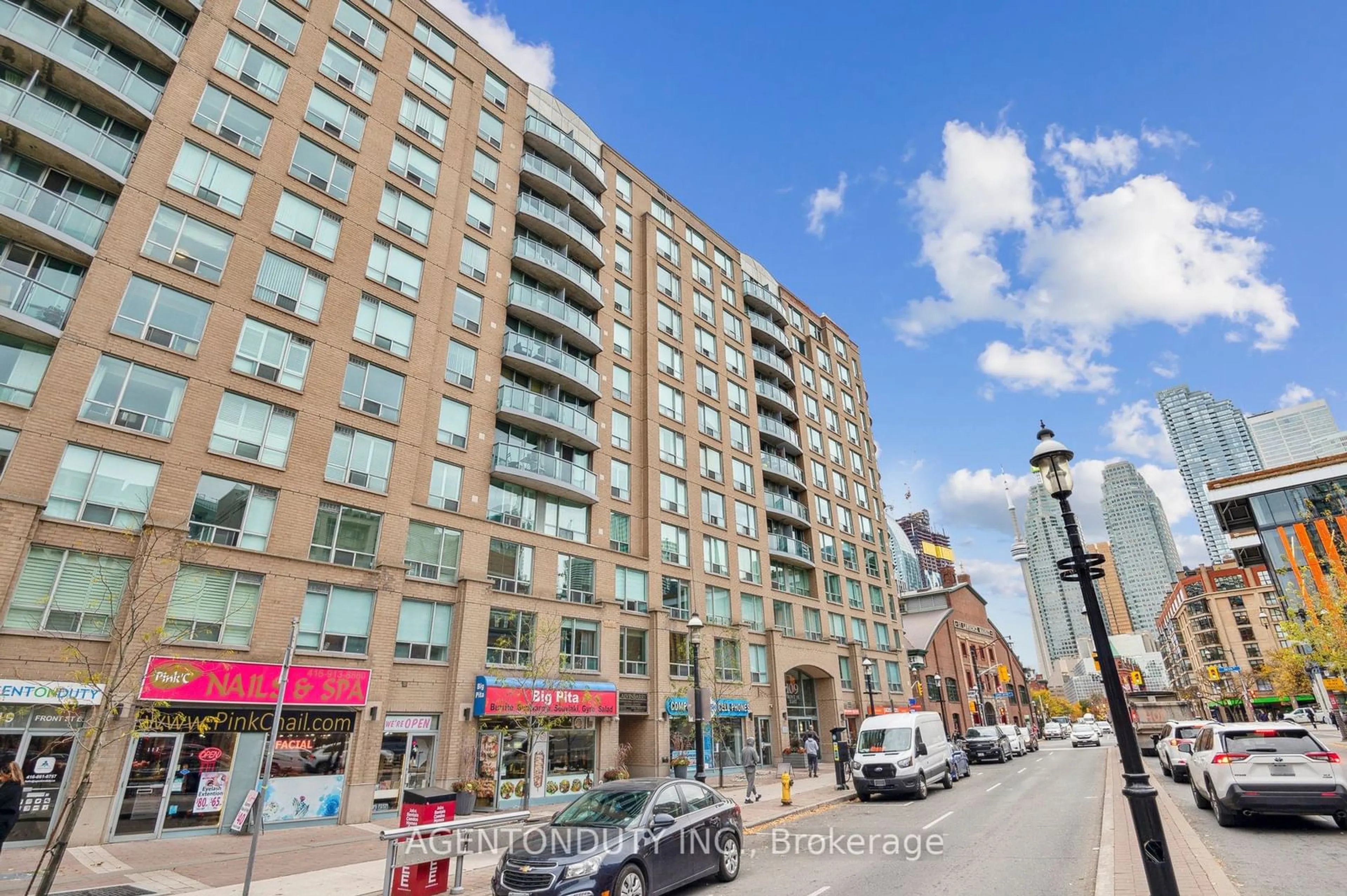 A pic from exterior of the house or condo, the street view for 109 Front St #1122, Toronto Ontario M5A 4P7