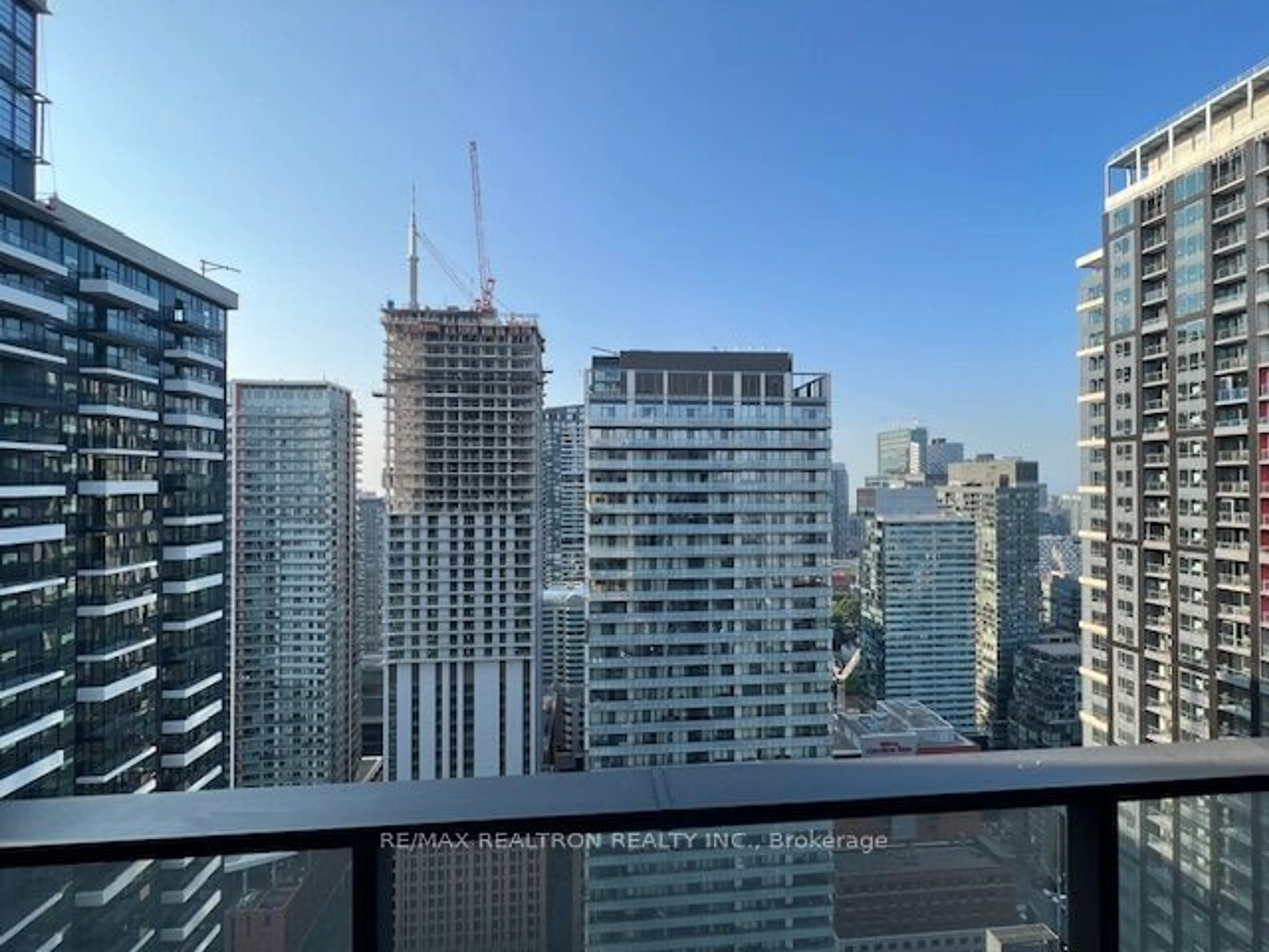 A pic from exterior of the house or condo, the view of city buildings for 125 PETER St #3610, Toronto Ontario M5V 0M2