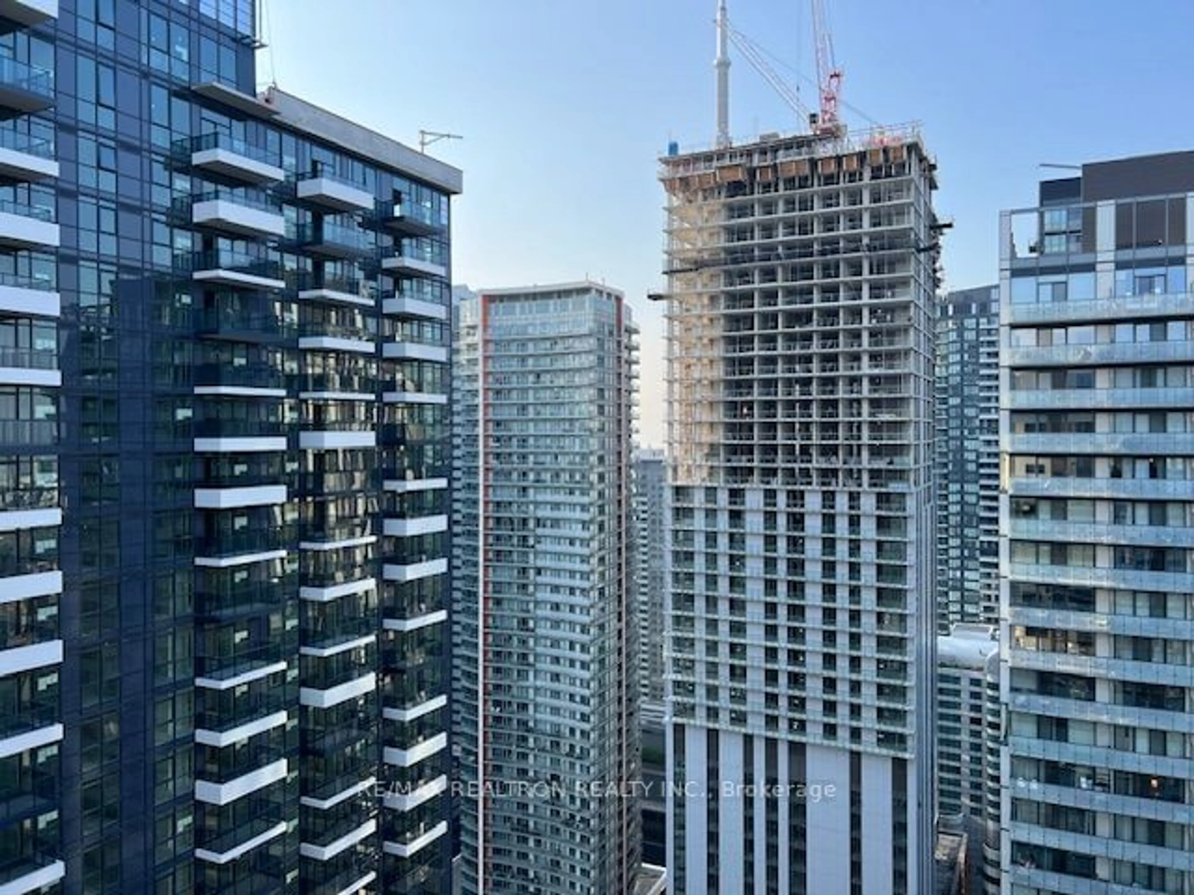 A pic from exterior of the house or condo, the view of city buildings for 125 PETER St #3610, Toronto Ontario M5V 0M2