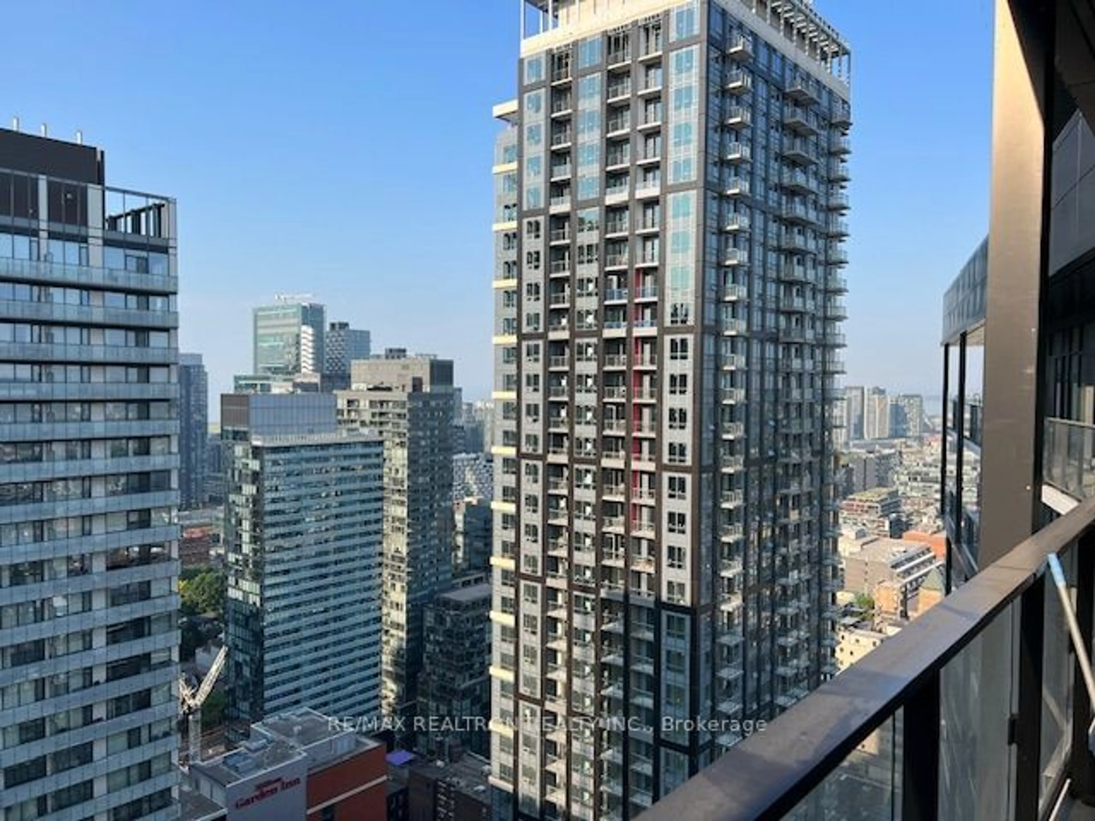 A pic from exterior of the house or condo, the view of city buildings for 125 PETER St #3610, Toronto Ontario M5V 0M2