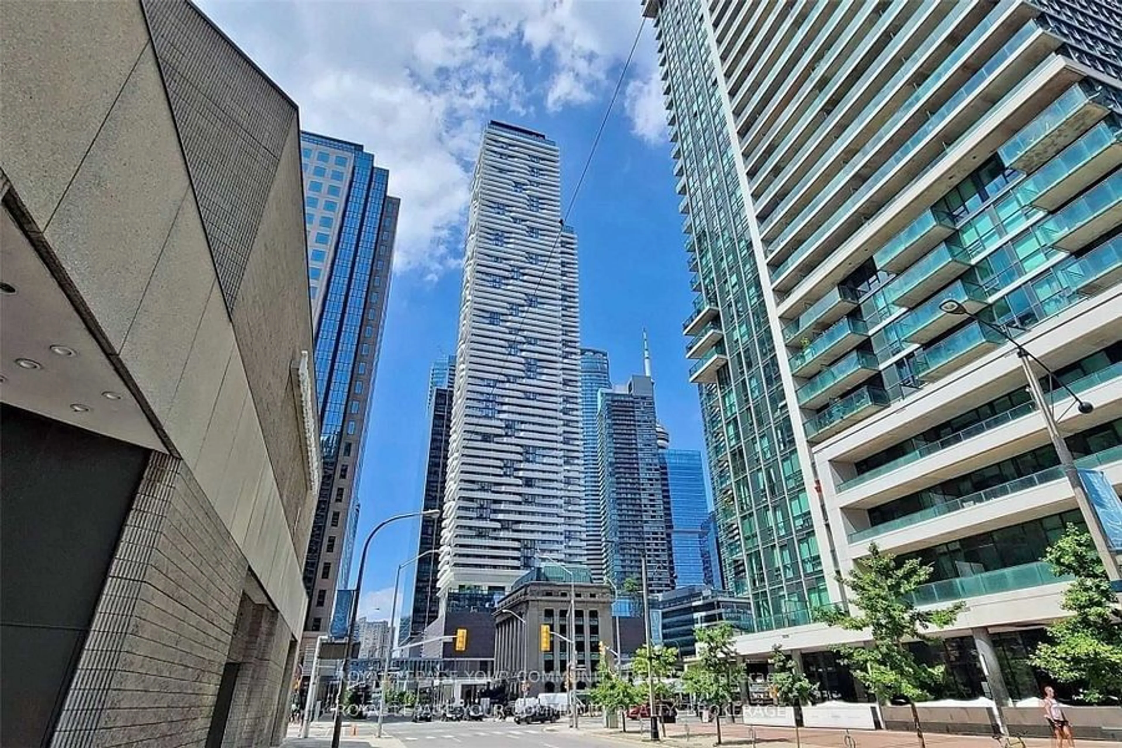 A pic from exterior of the house or condo, the view of city buildings for 100 HARBOUR St #2407, Toronto Ontario M5J 0B5