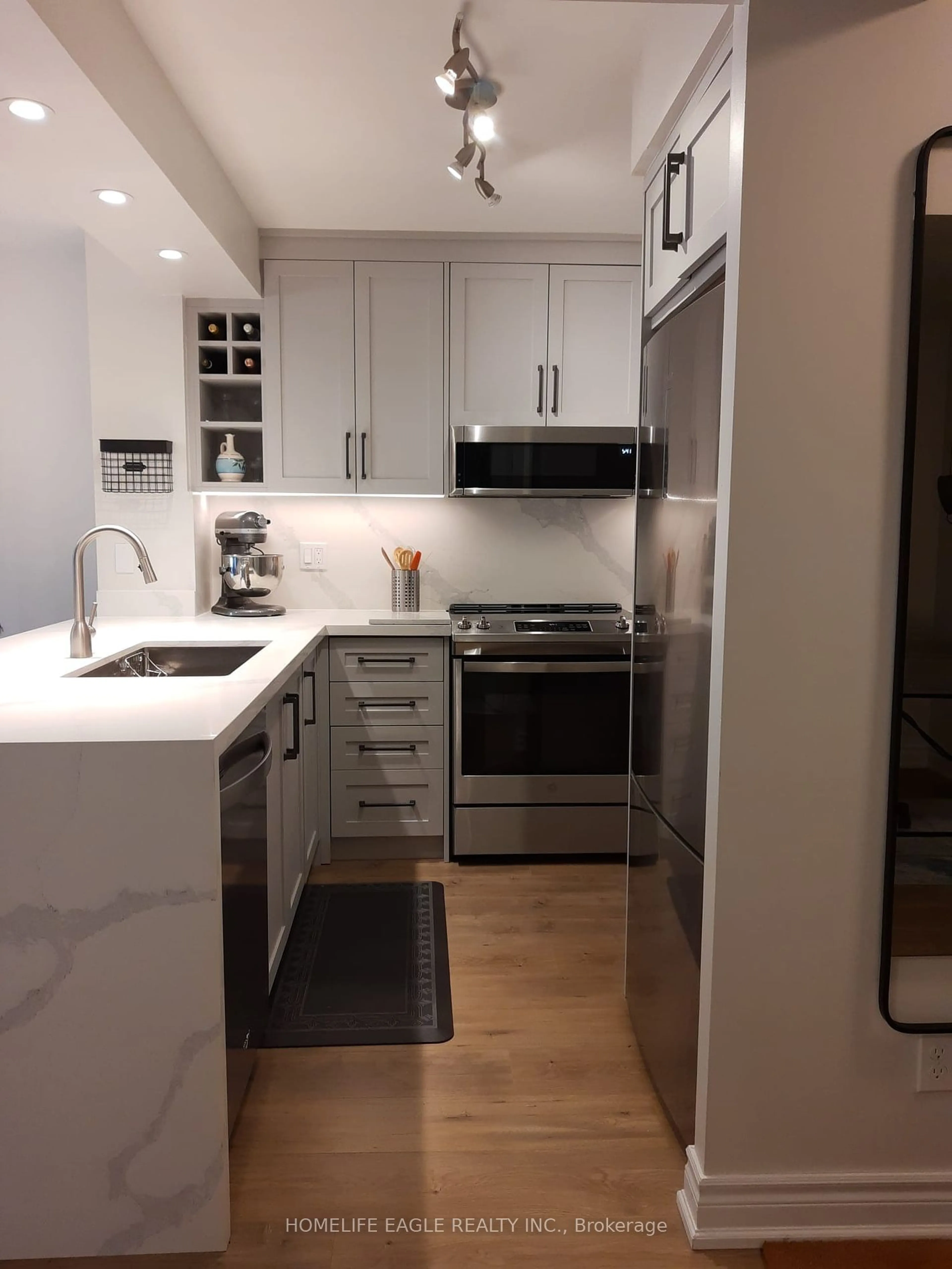 Contemporary kitchen, wood floors for 205 The Donway West #226, Toronto Ontario M3B 3S5