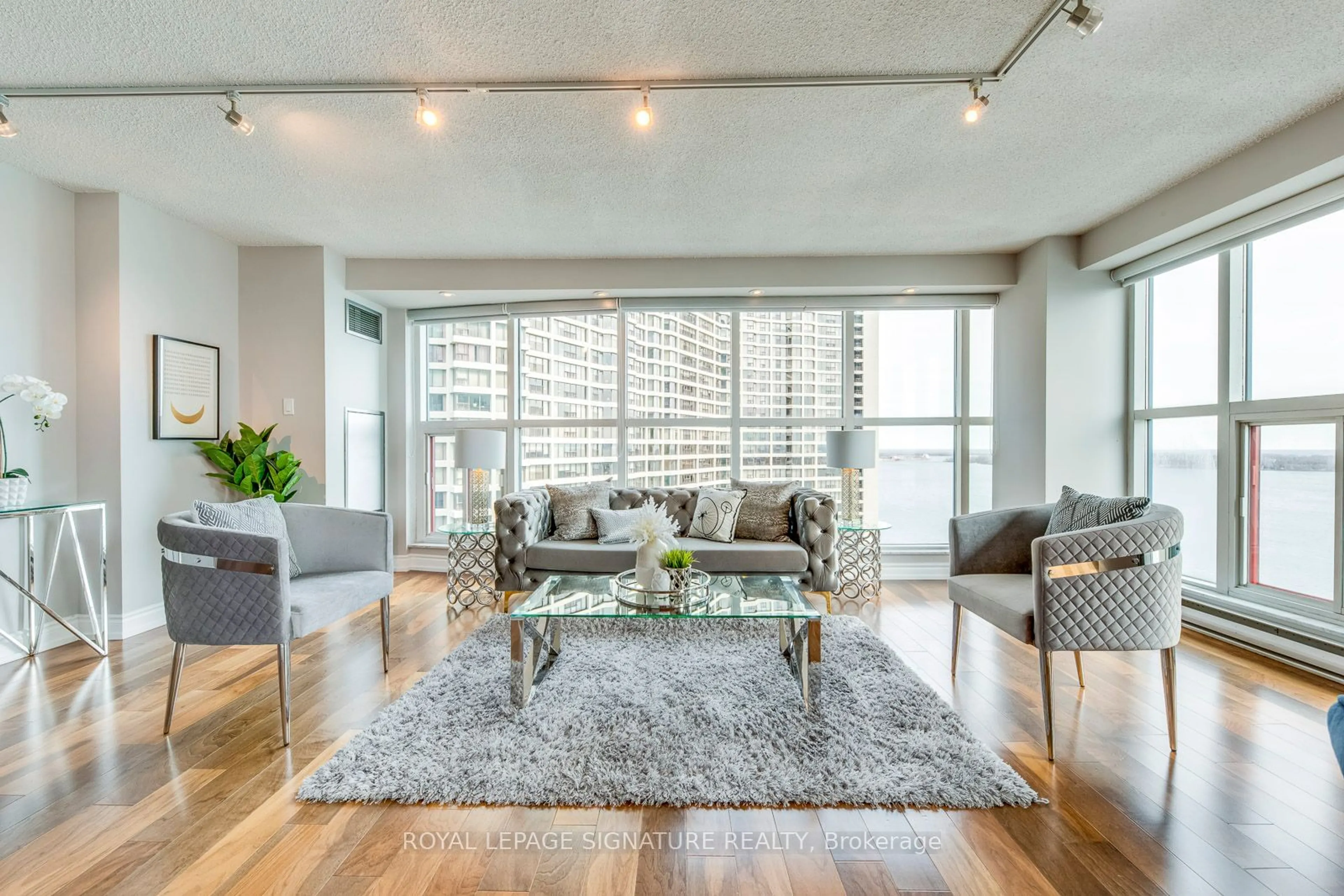 Living room, wood floors for 77 Harbour Sq #2207, Toronto Ontario M5J 2S2