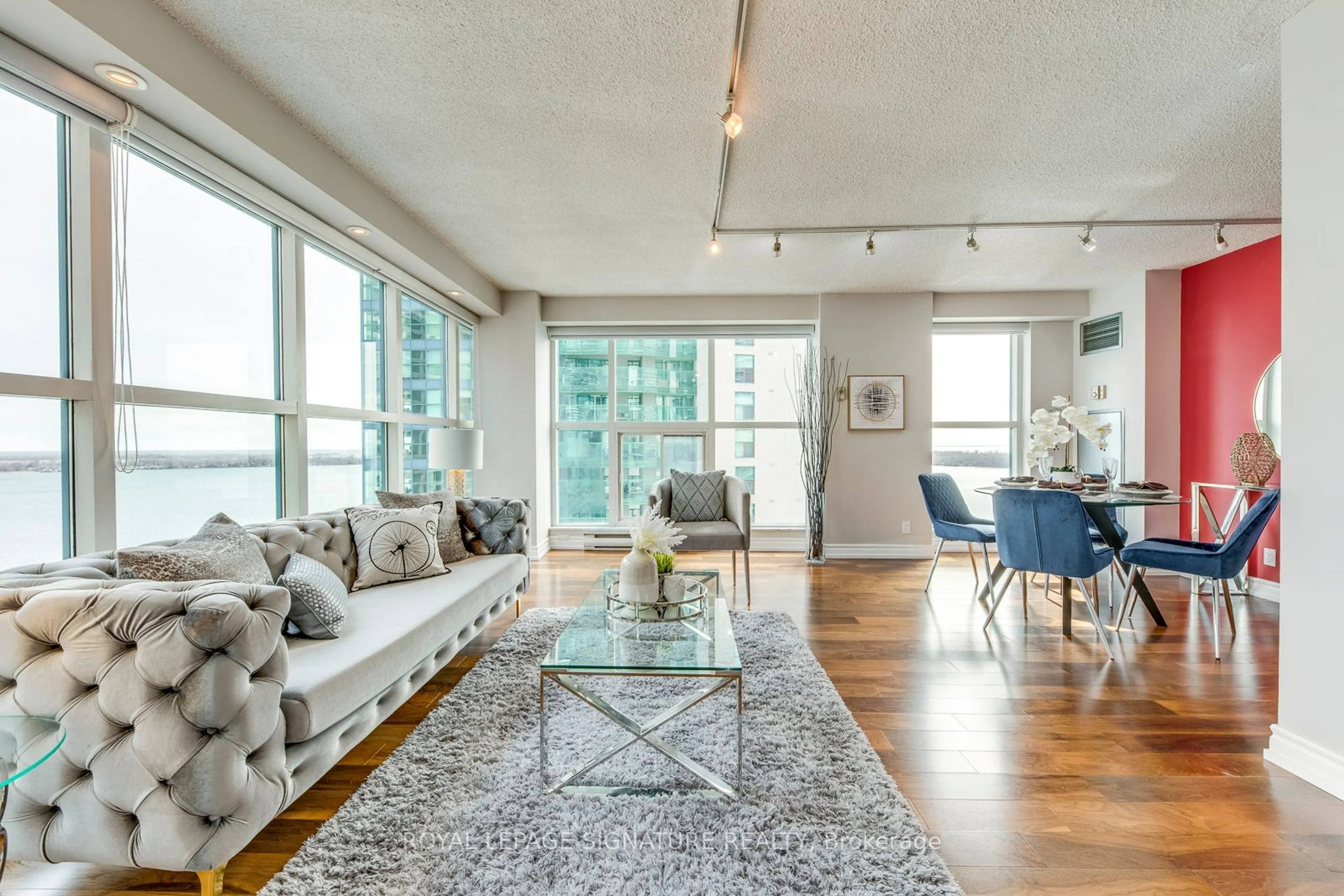 Living room, wood floors for 77 Harbour Sq #2207, Toronto Ontario M5J 2S2