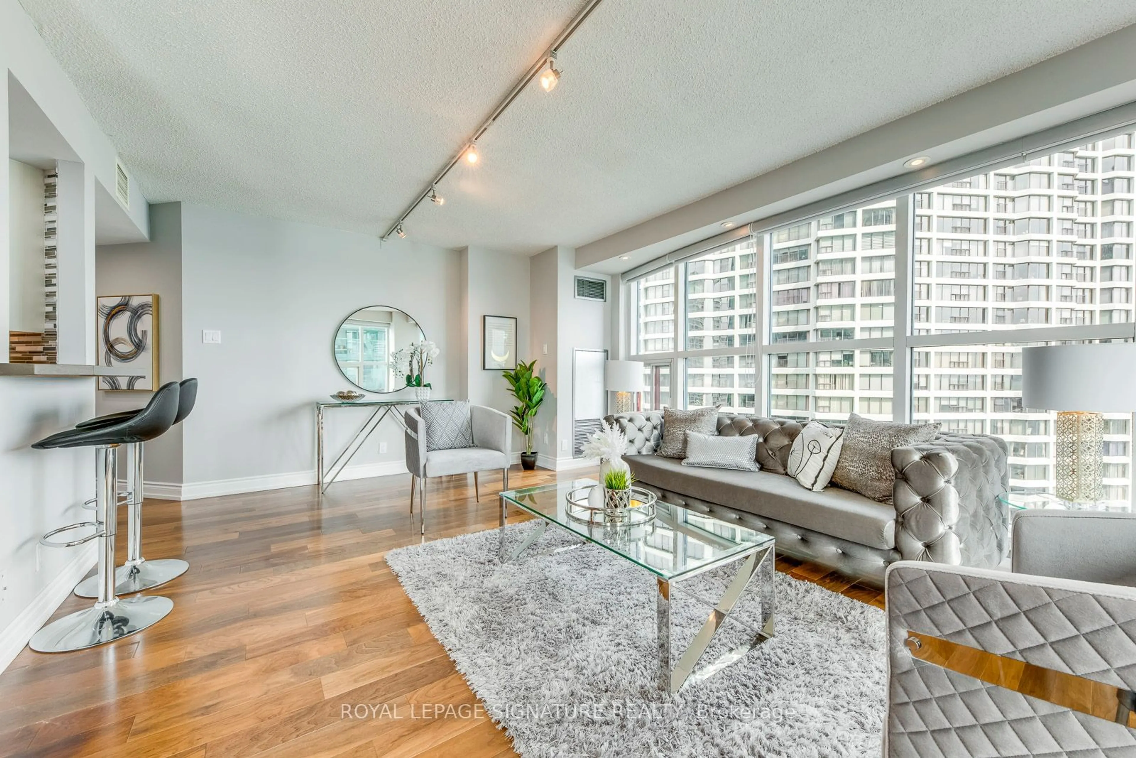 Living room, wood floors for 77 Harbour Sq #2207, Toronto Ontario M5J 2S2