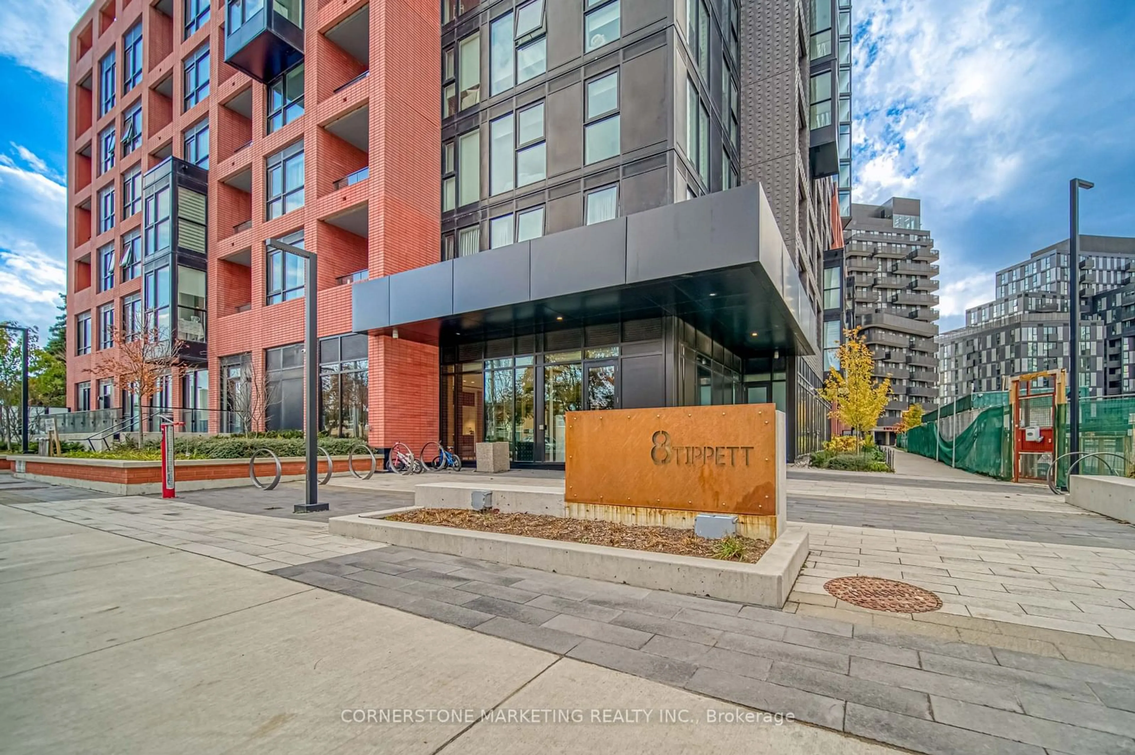 A pic from exterior of the house or condo, the street view for 8 Tippett Rd #102, Toronto Ontario M3H 0E7