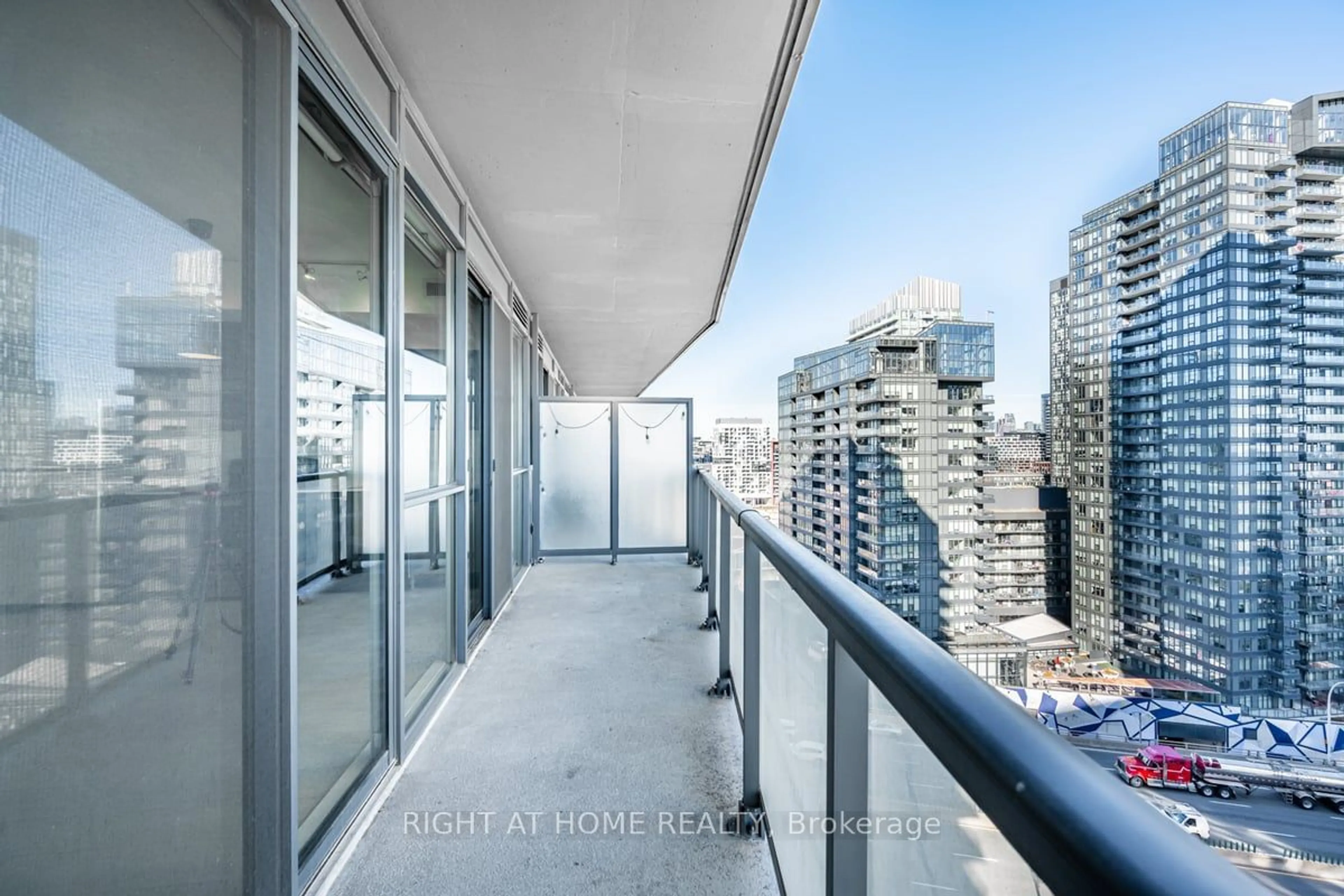 Balcony in the apartment, the view of city buildings for 20 Bruyeres Mews #1809, Toronto Ontario M5V 0G8