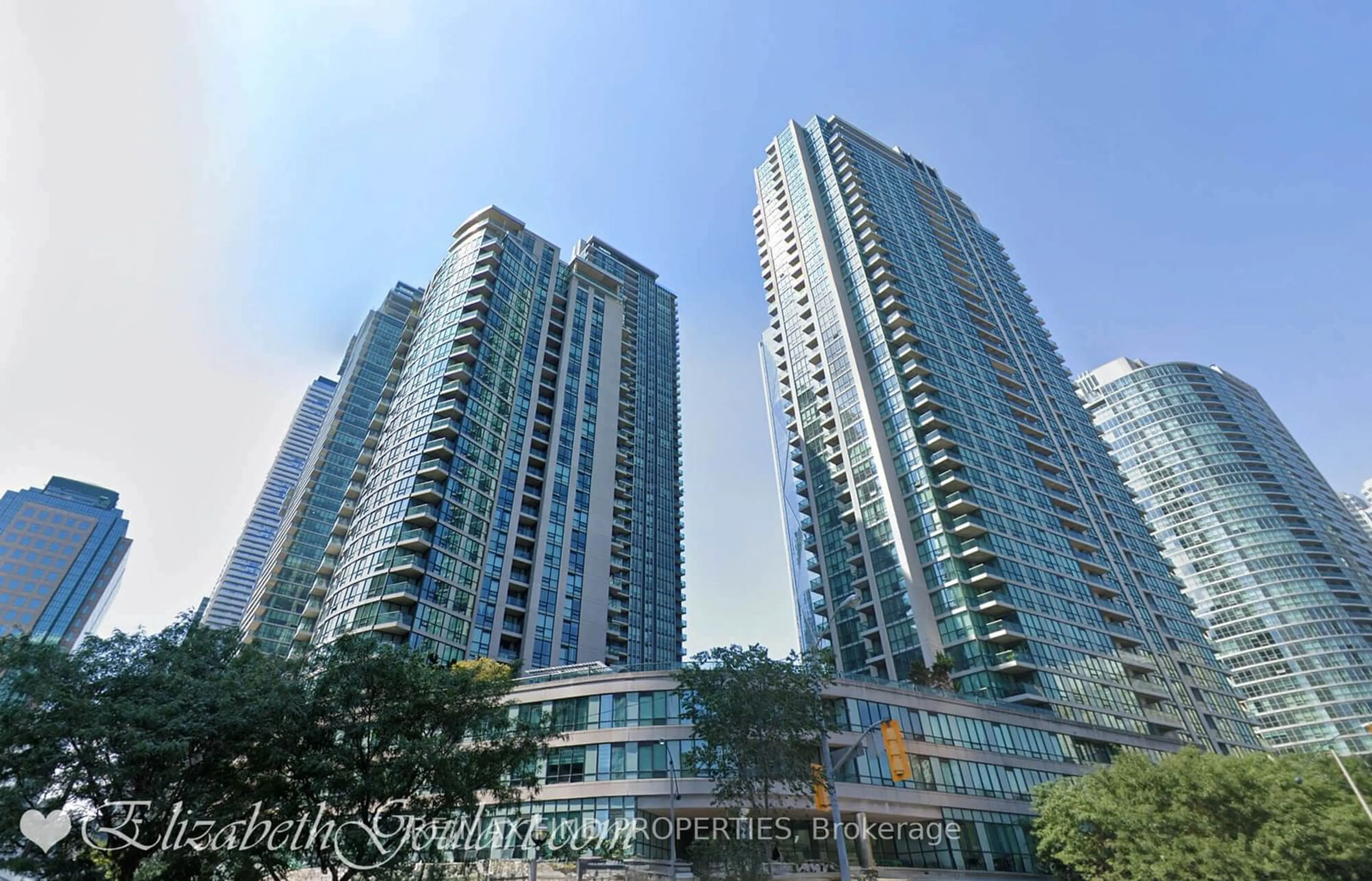 A pic from exterior of the house or condo, the view of city buildings for 12 Yonge St #1505, Toronto Ontario M5E 1Z9