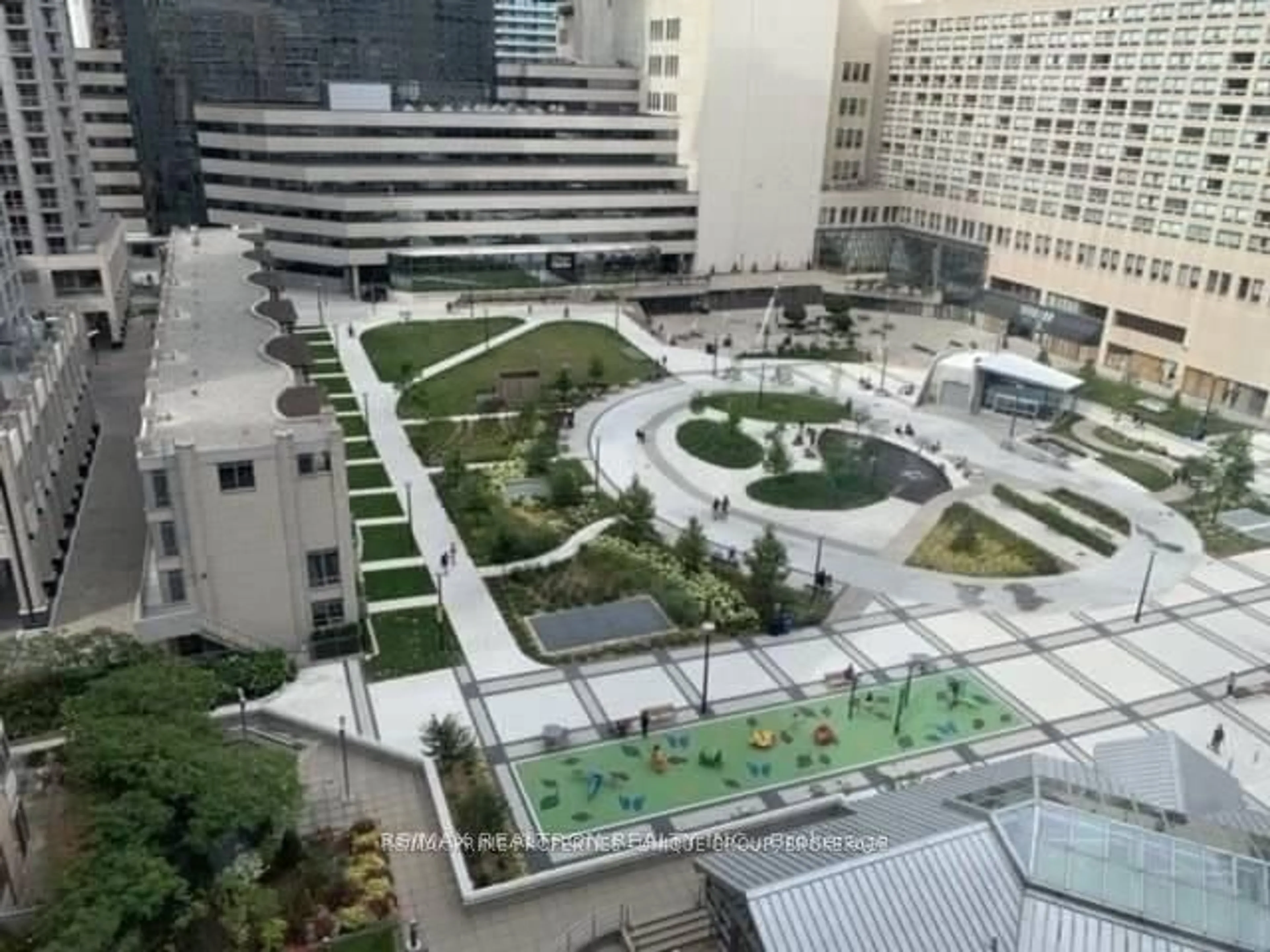 Patio, the view of city buildings for 44 Gerrard St #811, Toronto Ontario M5G 2K2