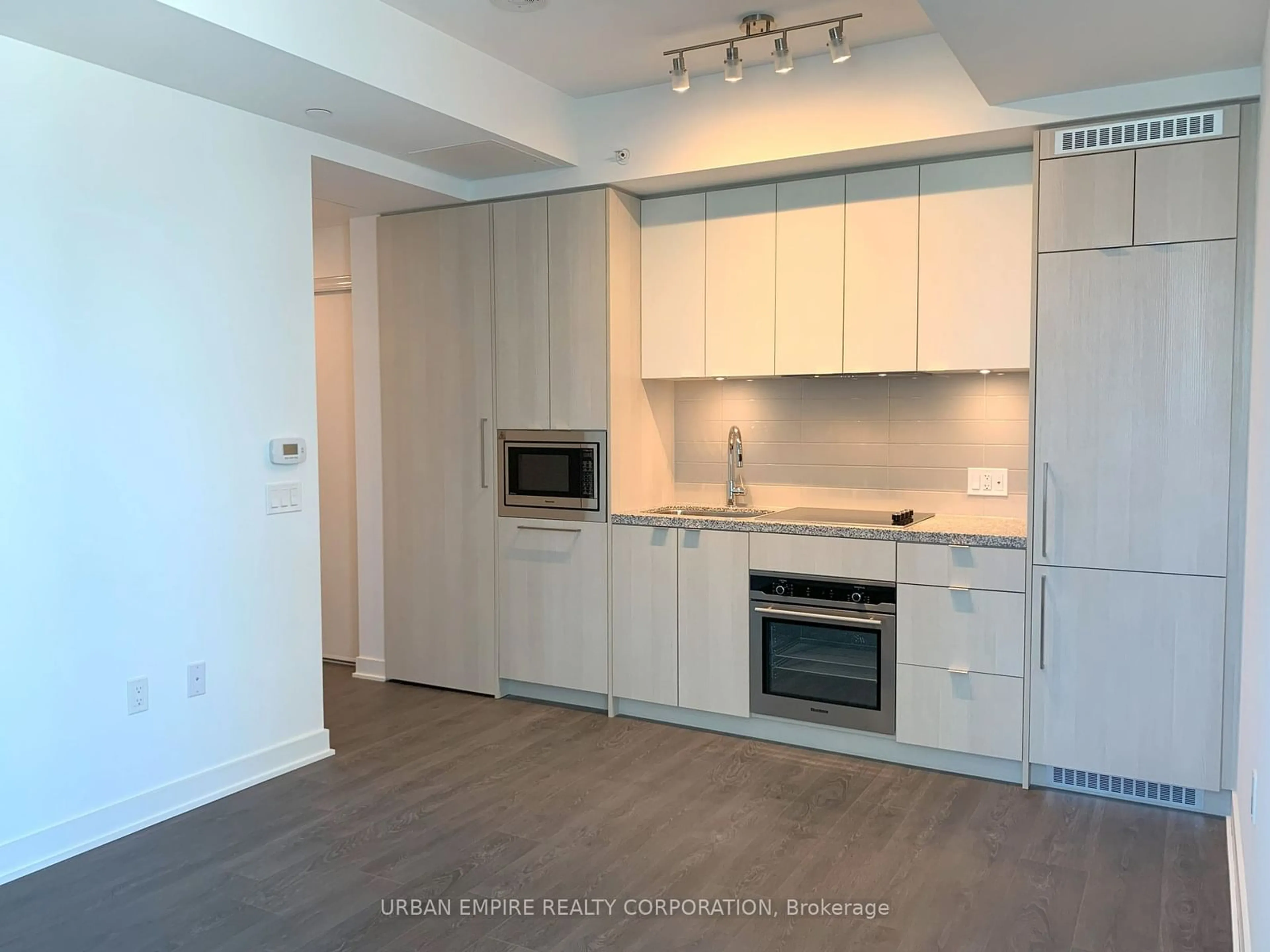 Standard kitchen, wood floors for 115 Blue Jays Way #4112, Toronto Ontario M5V 0N4