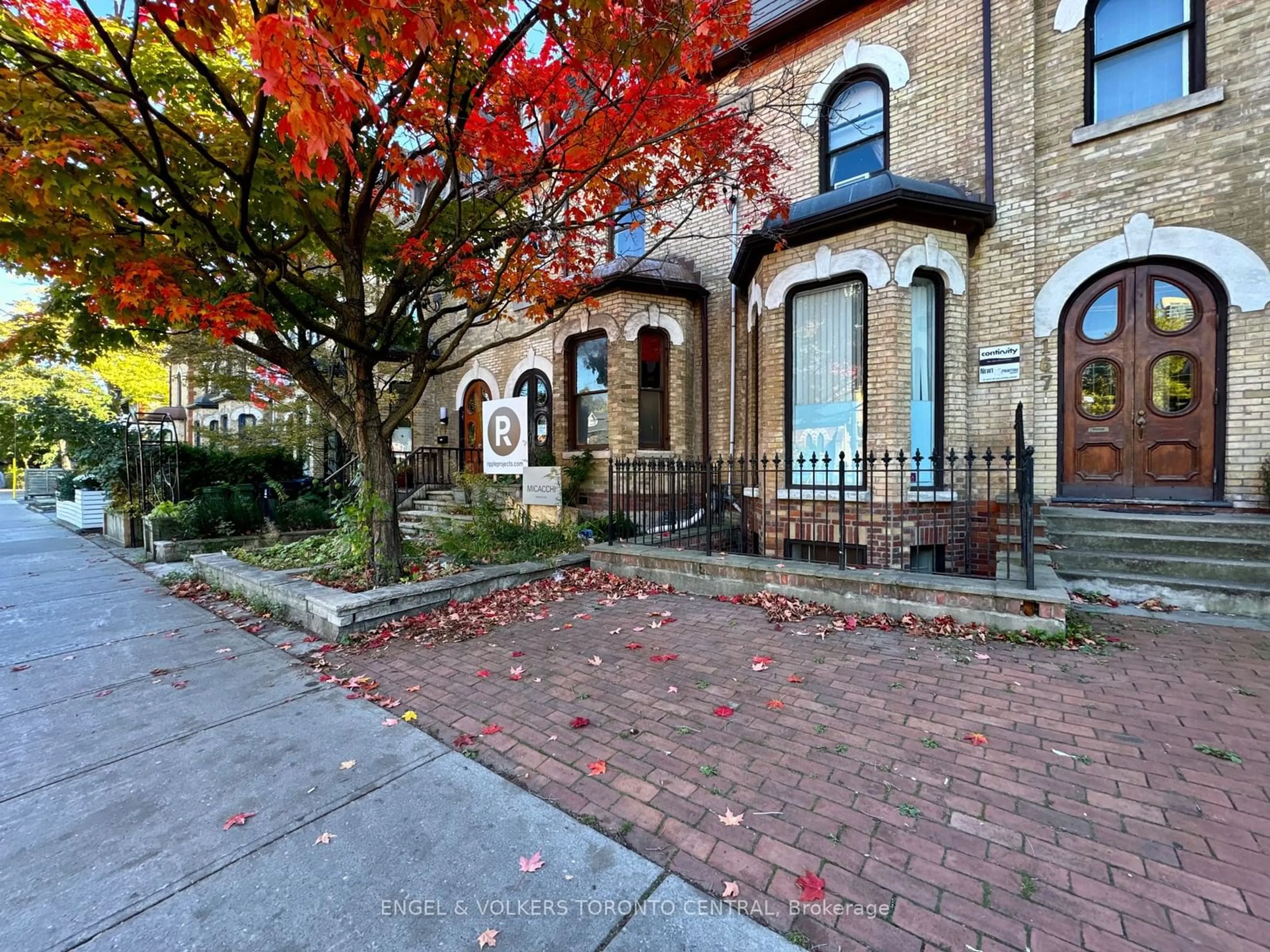 A pic from exterior of the house or condo, the street view for 167 Carlton St, Toronto Ontario M5A 2K3