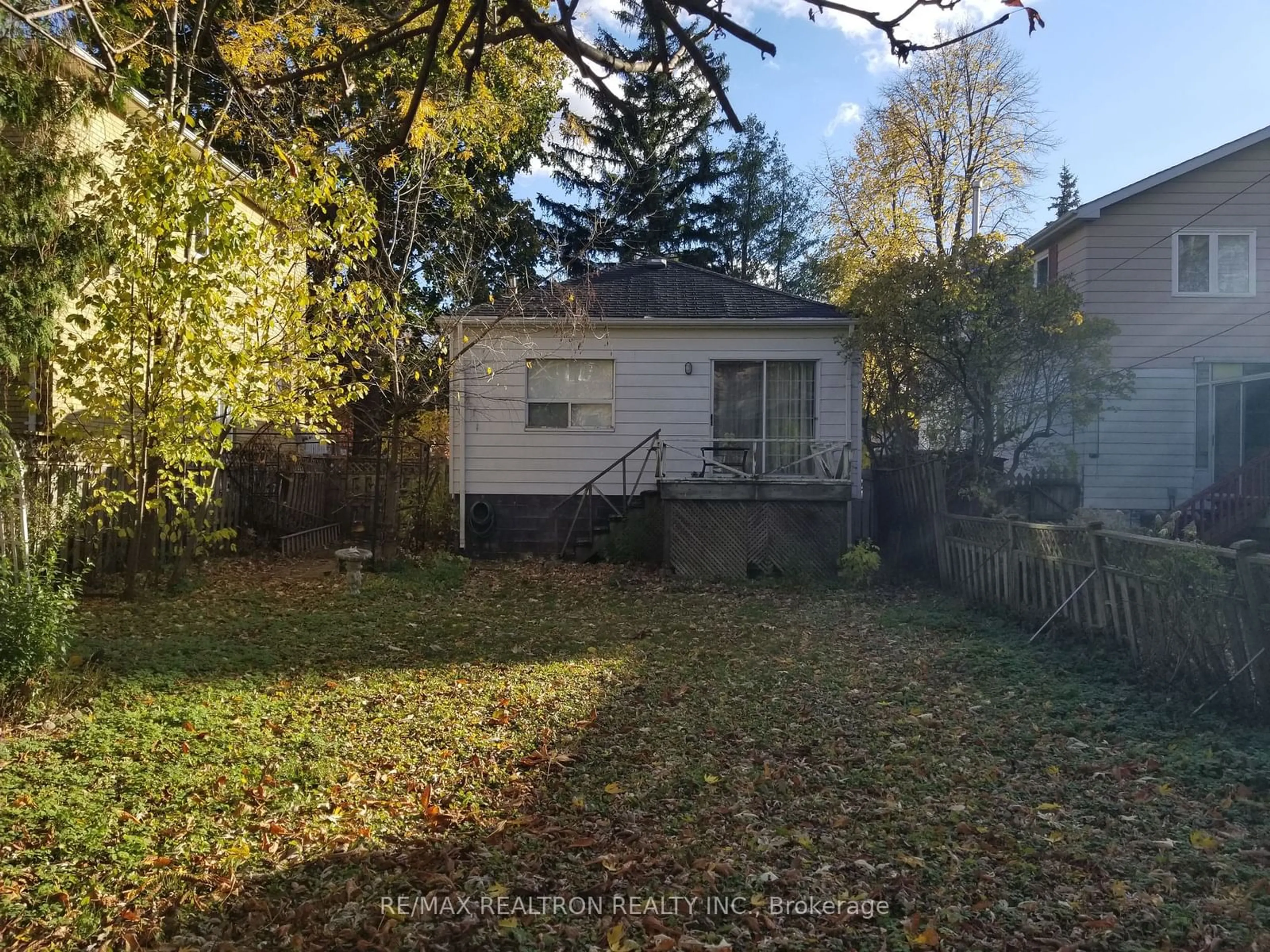 Frontside or backside of a home, the fenced backyard for 204 Greenfield Ave, Toronto Ontario M2N 3E3