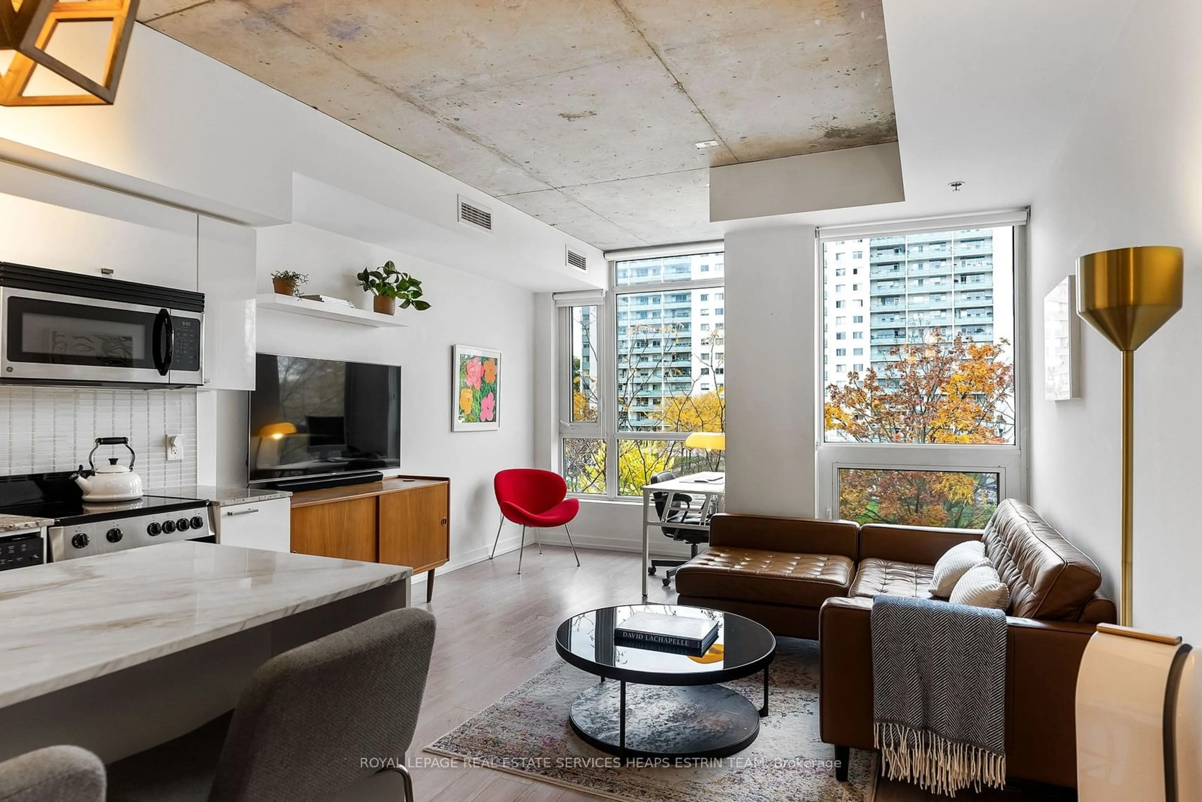 Living room, cement floor for 707 Dovercourt Rd #311, Toronto Ontario M6H 0B5