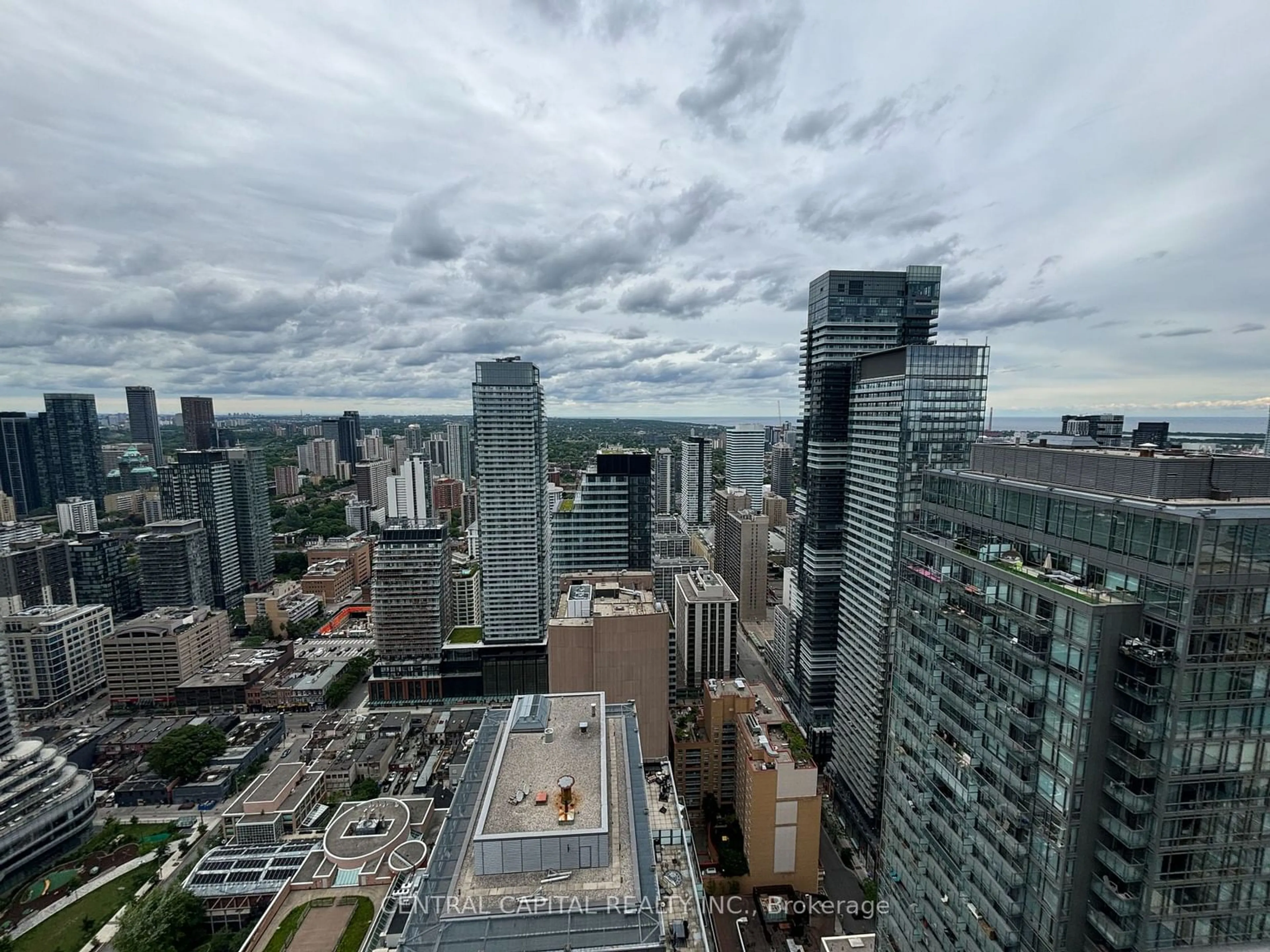 A pic from exterior of the house or condo, the view of city buildings for 832 Bay St #4805, Toronto Ontario M5S 1Z6