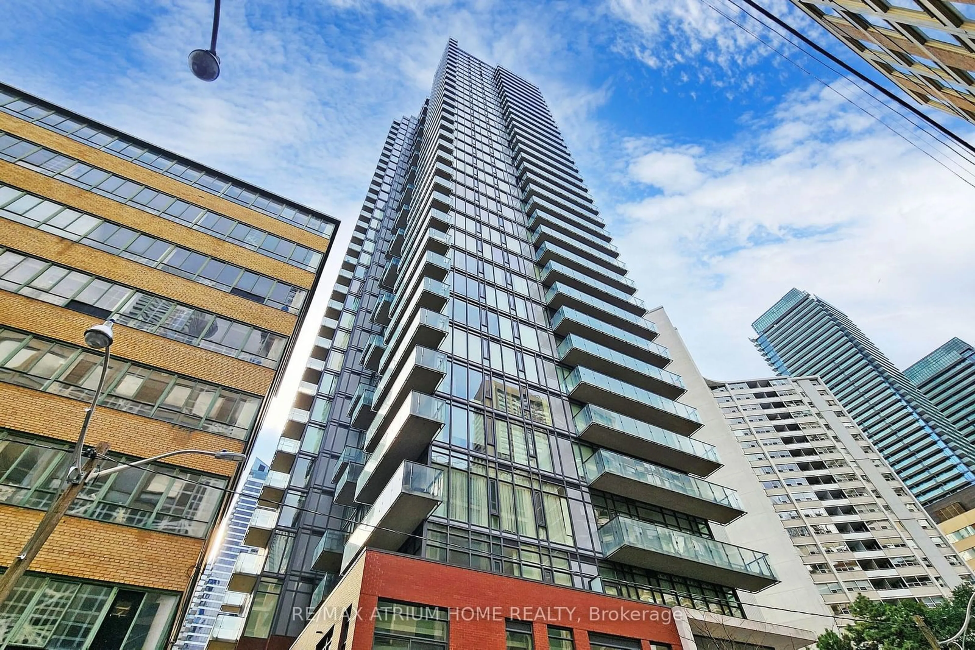 A pic from exterior of the house or condo, the front or back of building for 75 St Nicholas St #405, Toronto Ontario M4Y 0A5