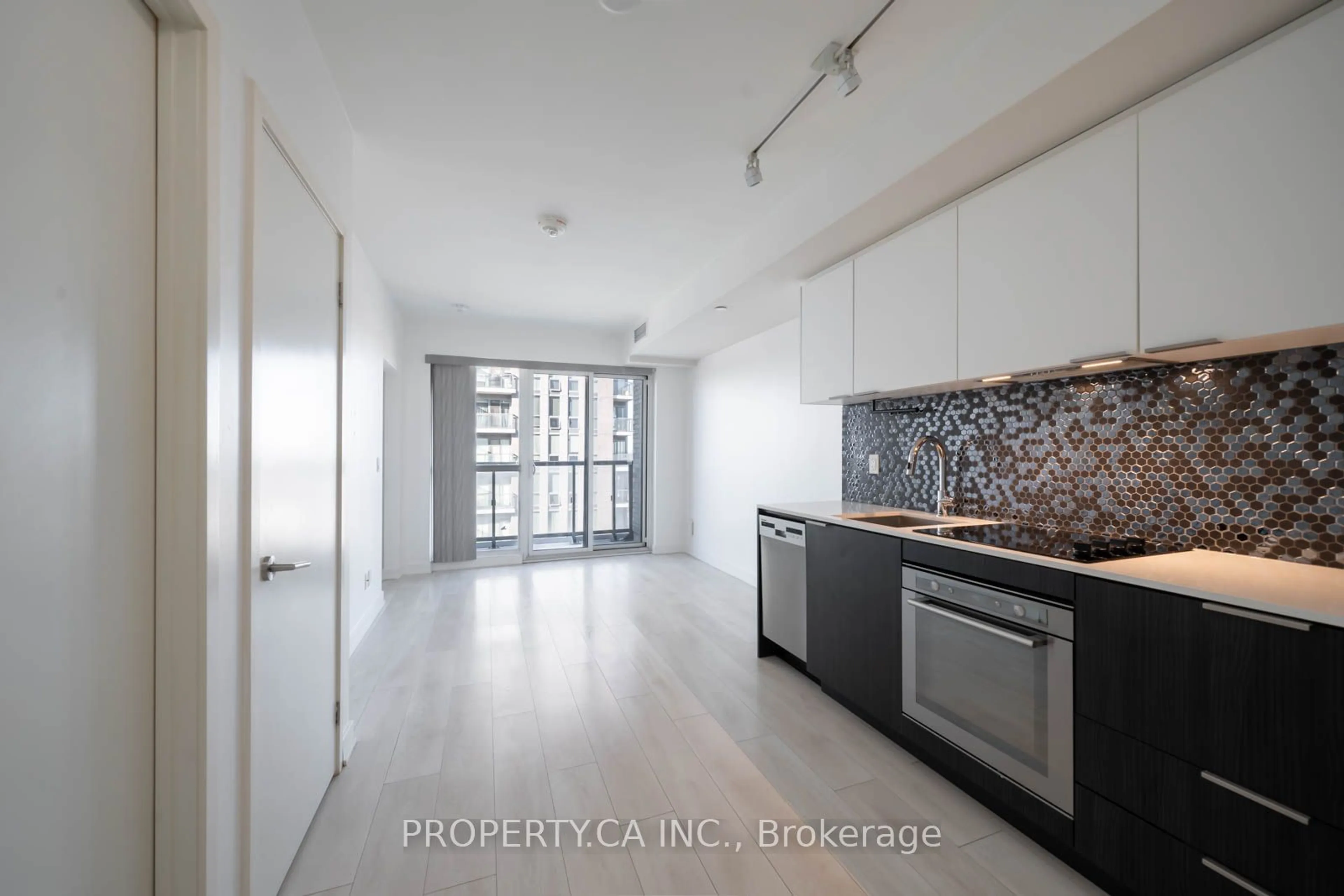 Open concept kitchen for 2 Sonic Way #2404, Toronto Ontario M3C 0P2