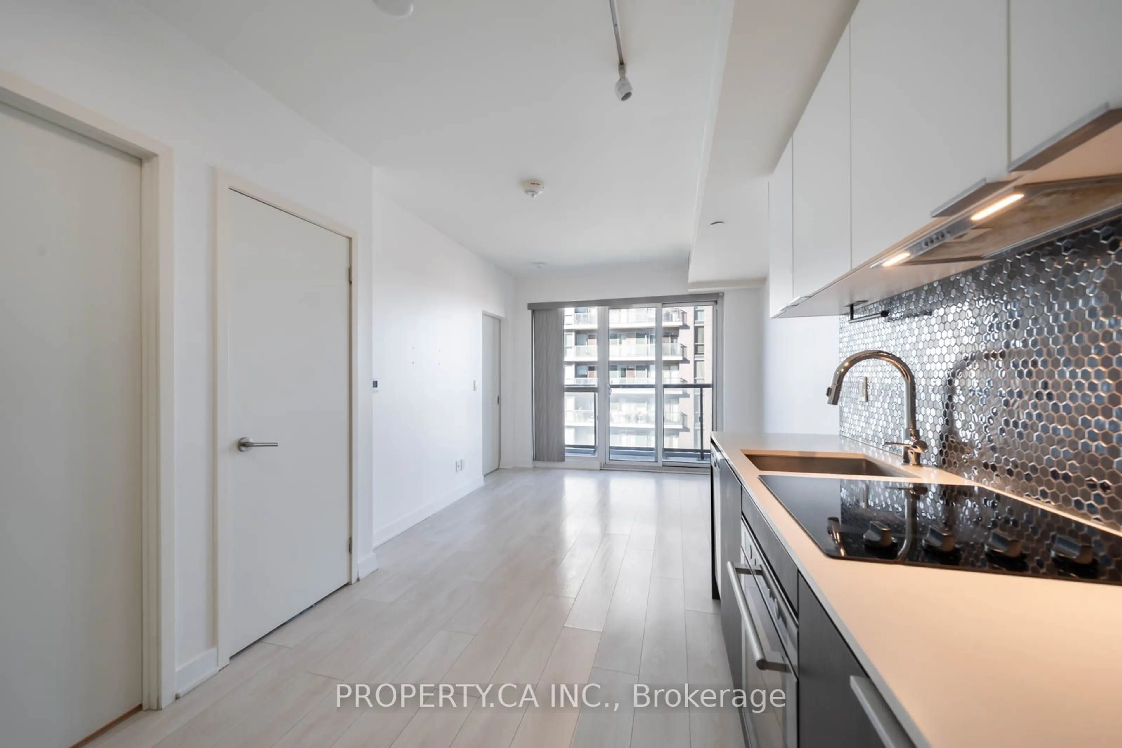 Open concept kitchen for 2 Sonic Way #2404, Toronto Ontario M3C 0P2