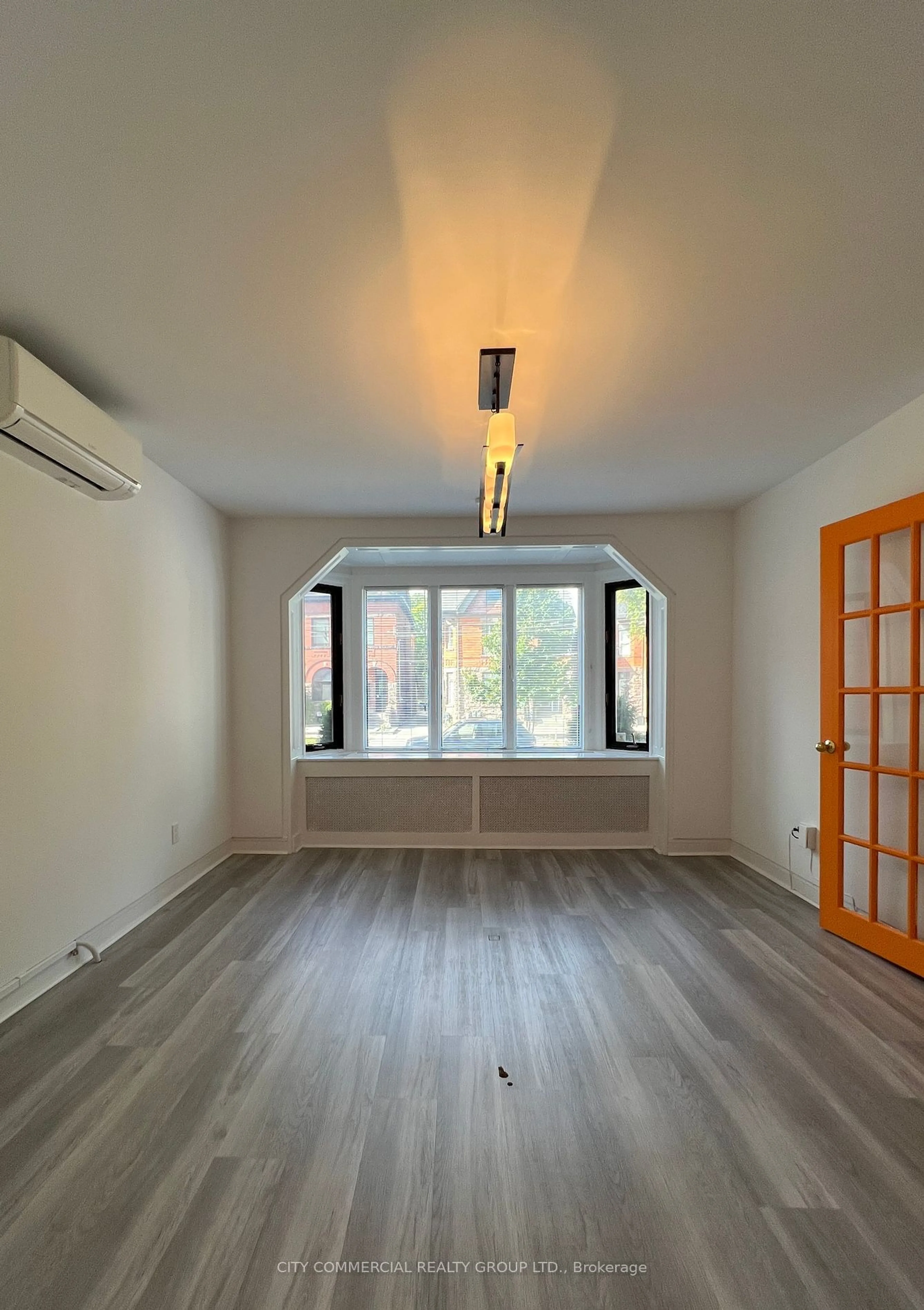 A pic of a room, wood floors for 33 Madison Ave, Toronto Ontario M5R 2S2