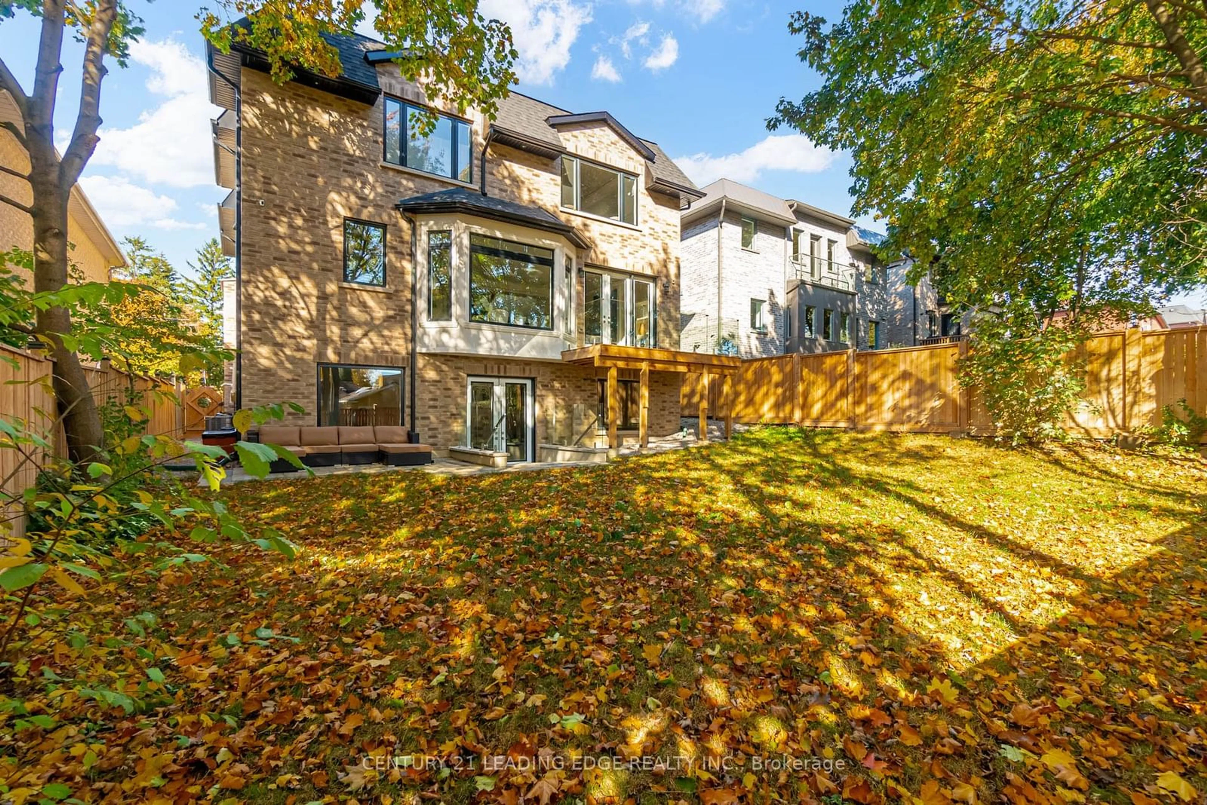 Frontside or backside of a home, the fenced backyard for 179 Burndale Ave, Toronto Ontario M2N 1T1