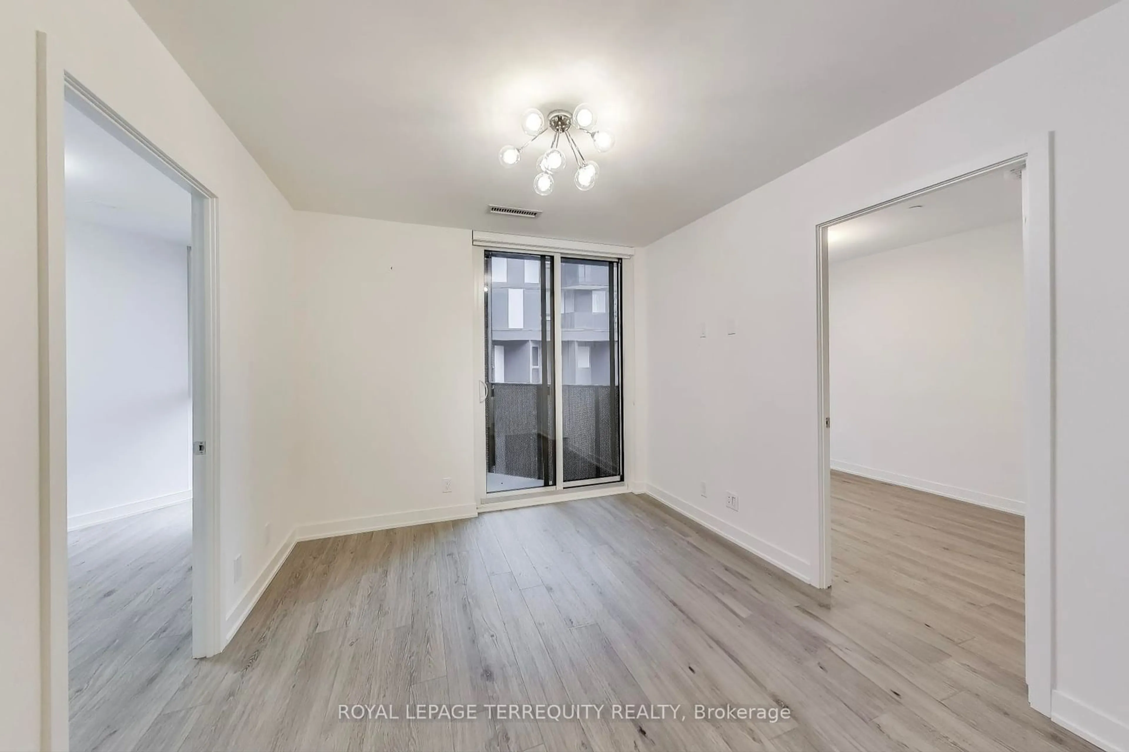 A pic of a room, wood floors for 30 Tretti Way #702, Toronto Ontario M3H 0E3