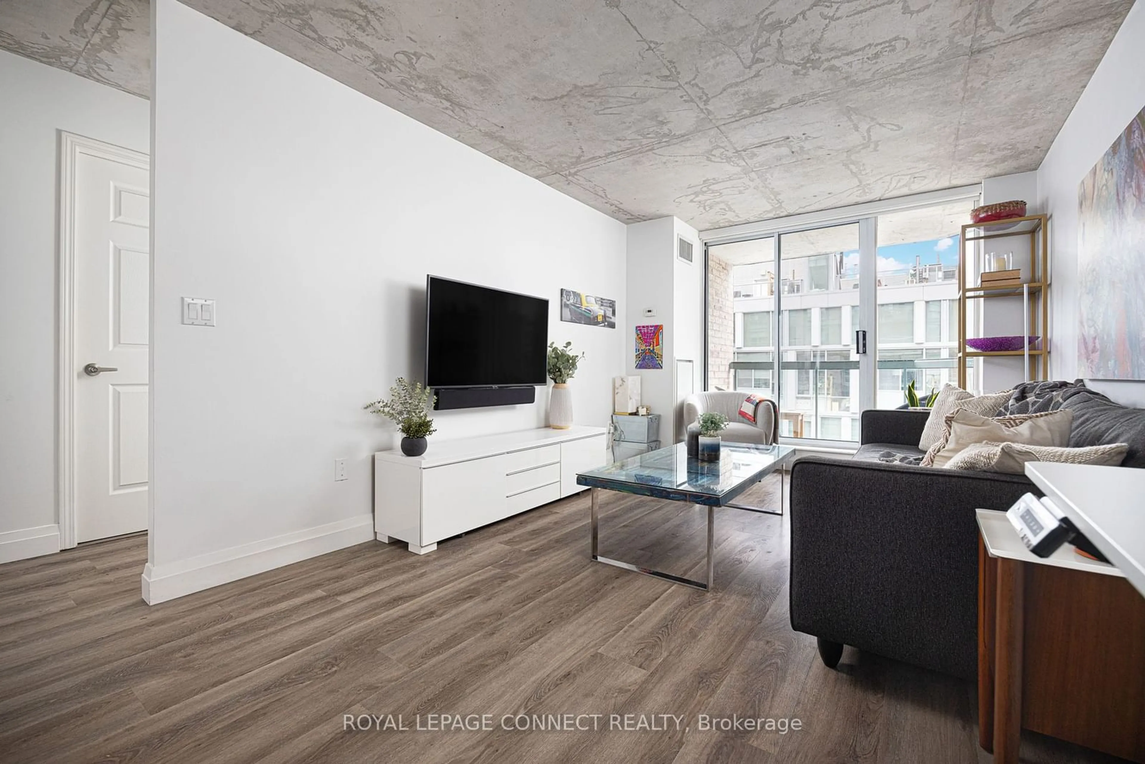 Living room, cement floor for 311 Richmond St #705, Toronto Ontario M5A 4S8