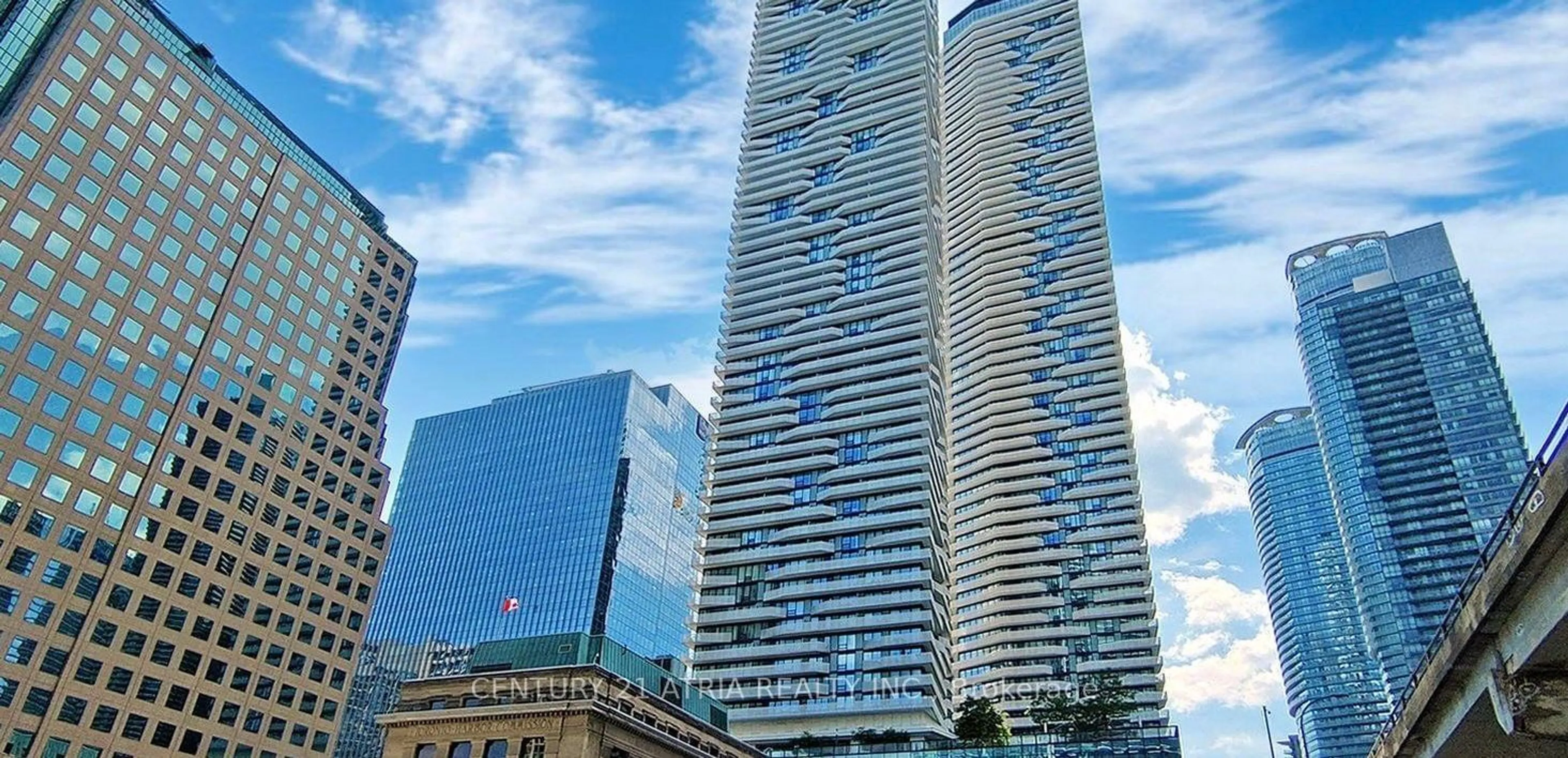 A pic from exterior of the house or condo, the view of city buildings for 100 Harbour St #6604, Toronto Ontario M5J 0B5