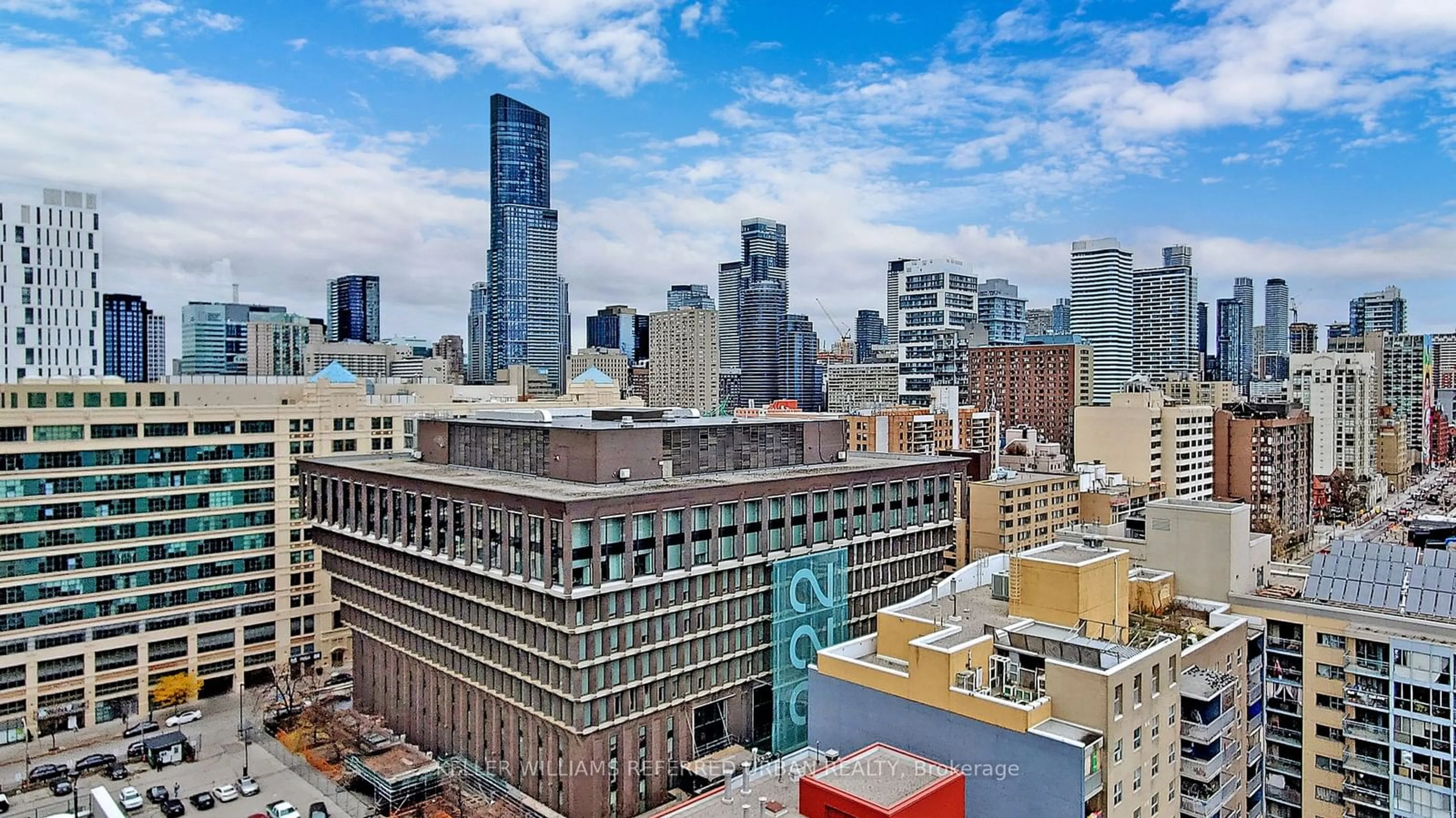 A pic from exterior of the house or condo, the view of city buildings for 251 Jarvis St #221, Toronto Ontario M5B 0C3