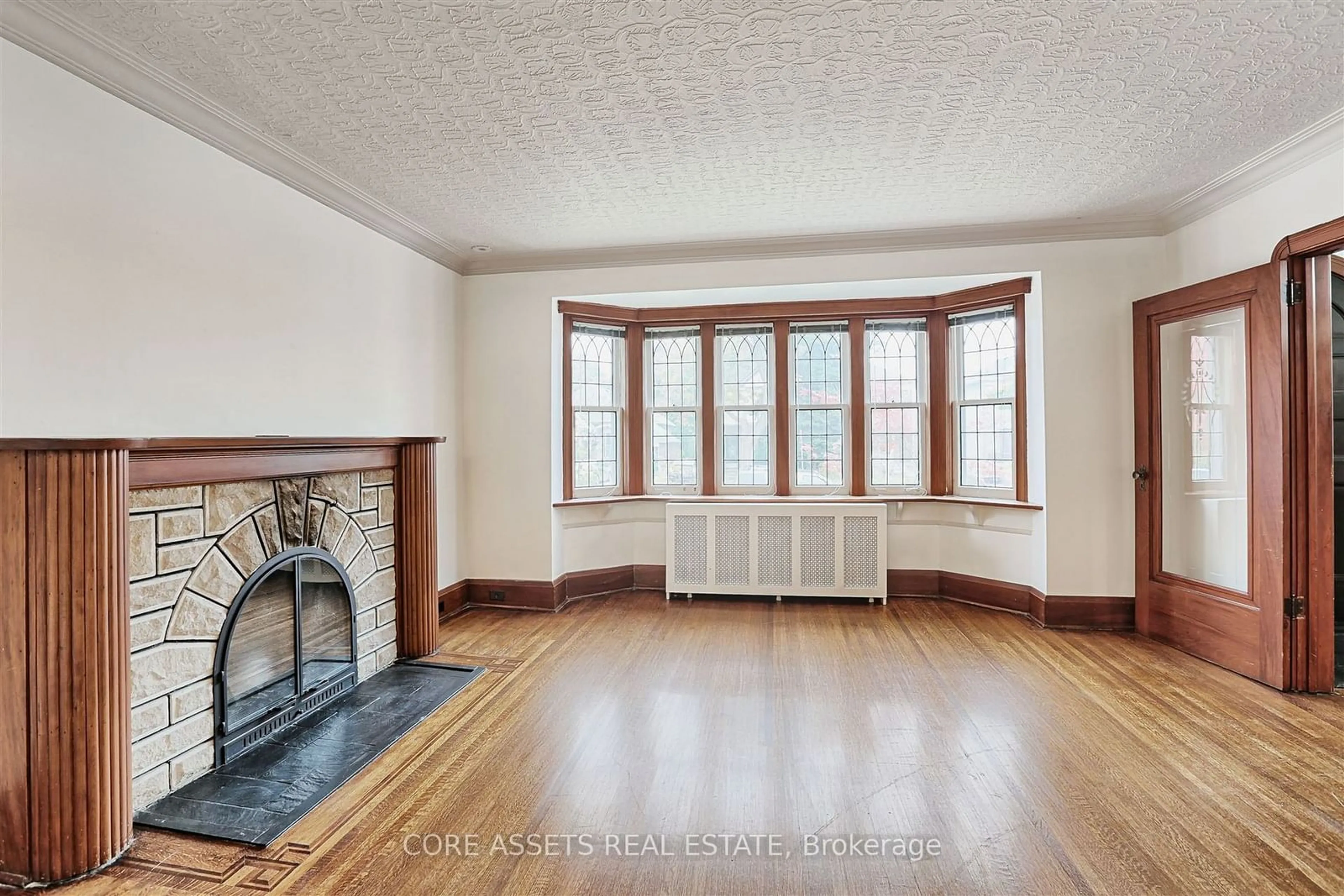 Living room, wood floors for 8 Park Hill Rd, Toronto Ontario M6C 3M9