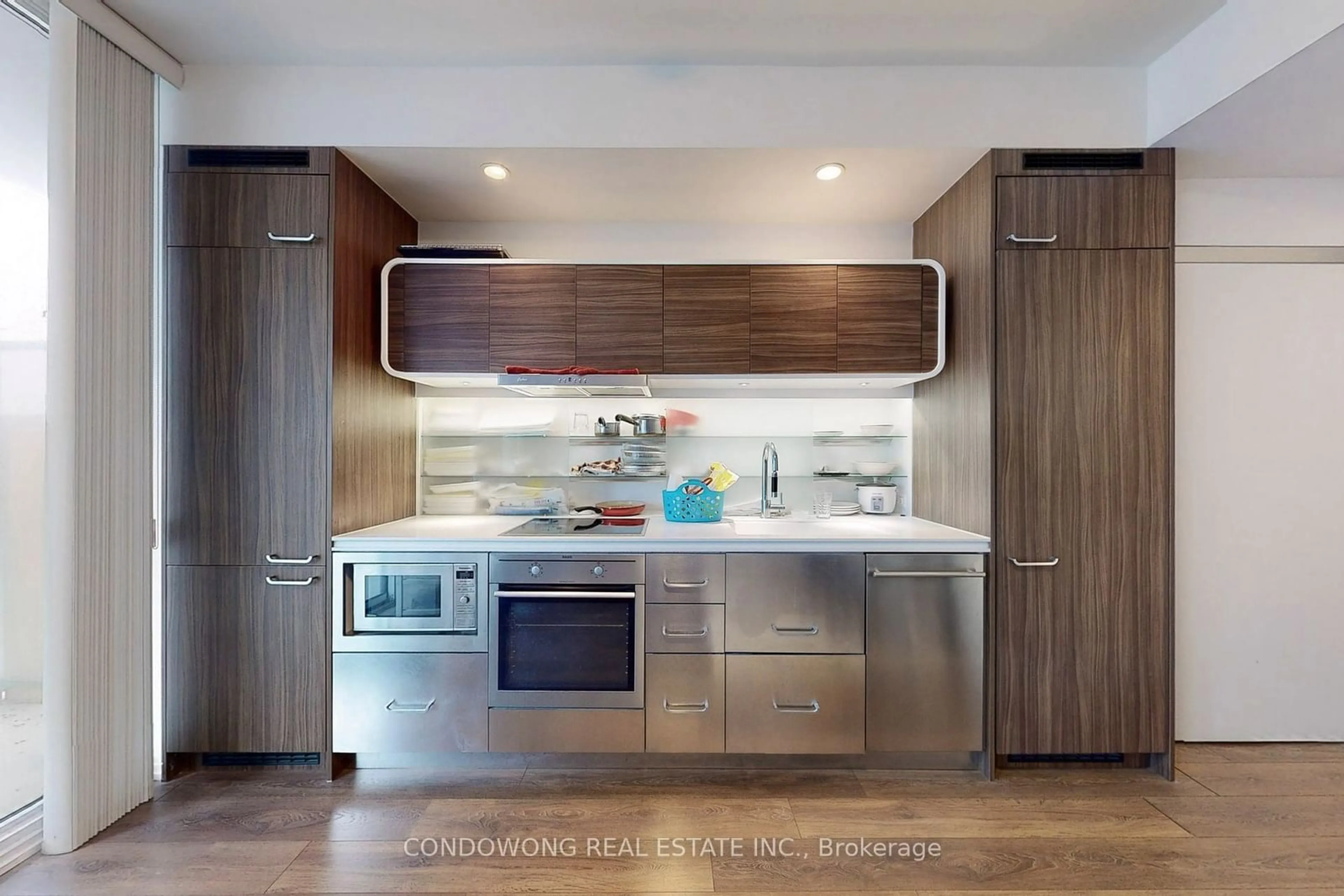 Contemporary kitchen, wood floors for 45 Charles St #1103, Toronto Ontario M4Y 0B8