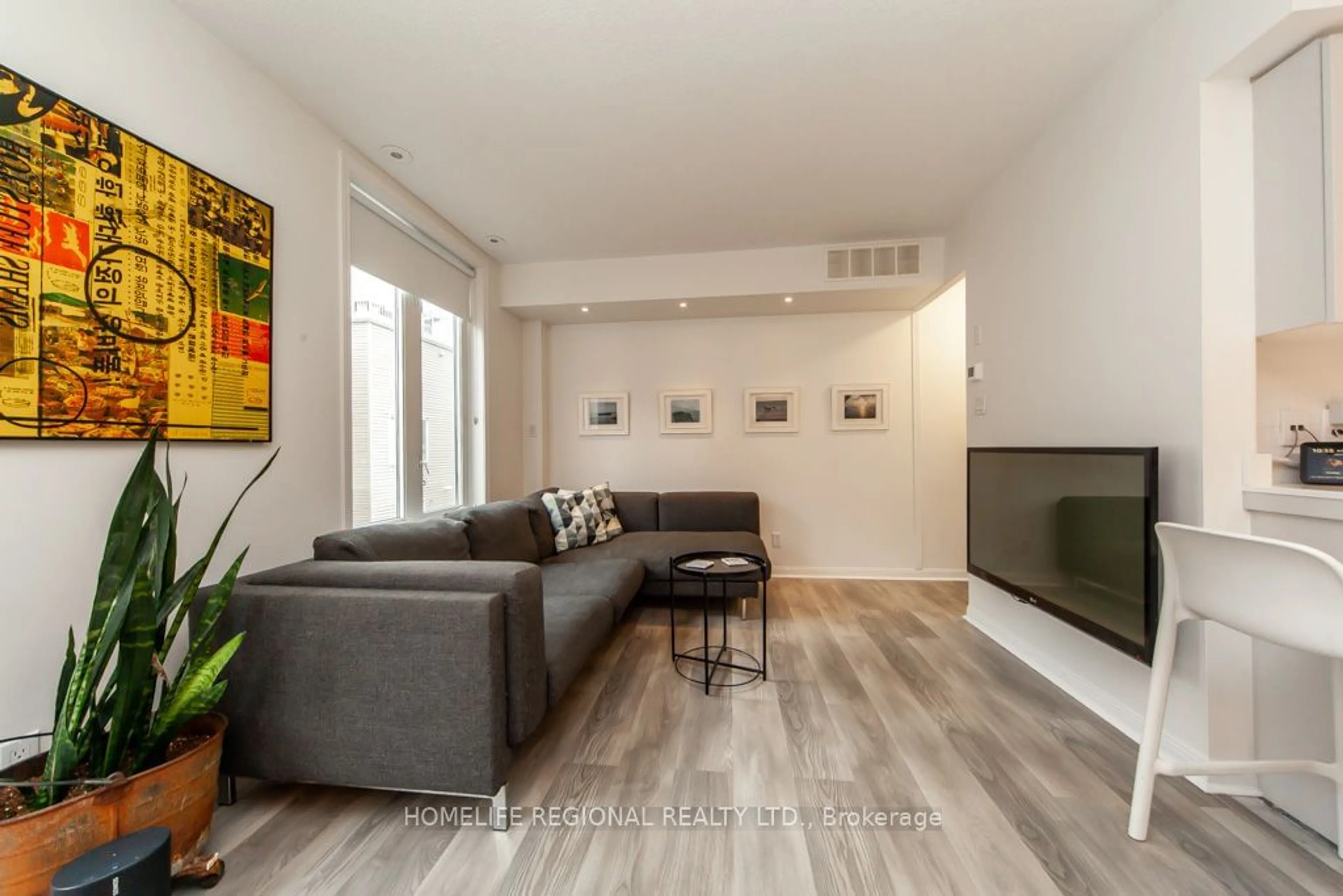 Living room, wood floors for 12 Douro St #428, Toronto Ontario M6K 3M4