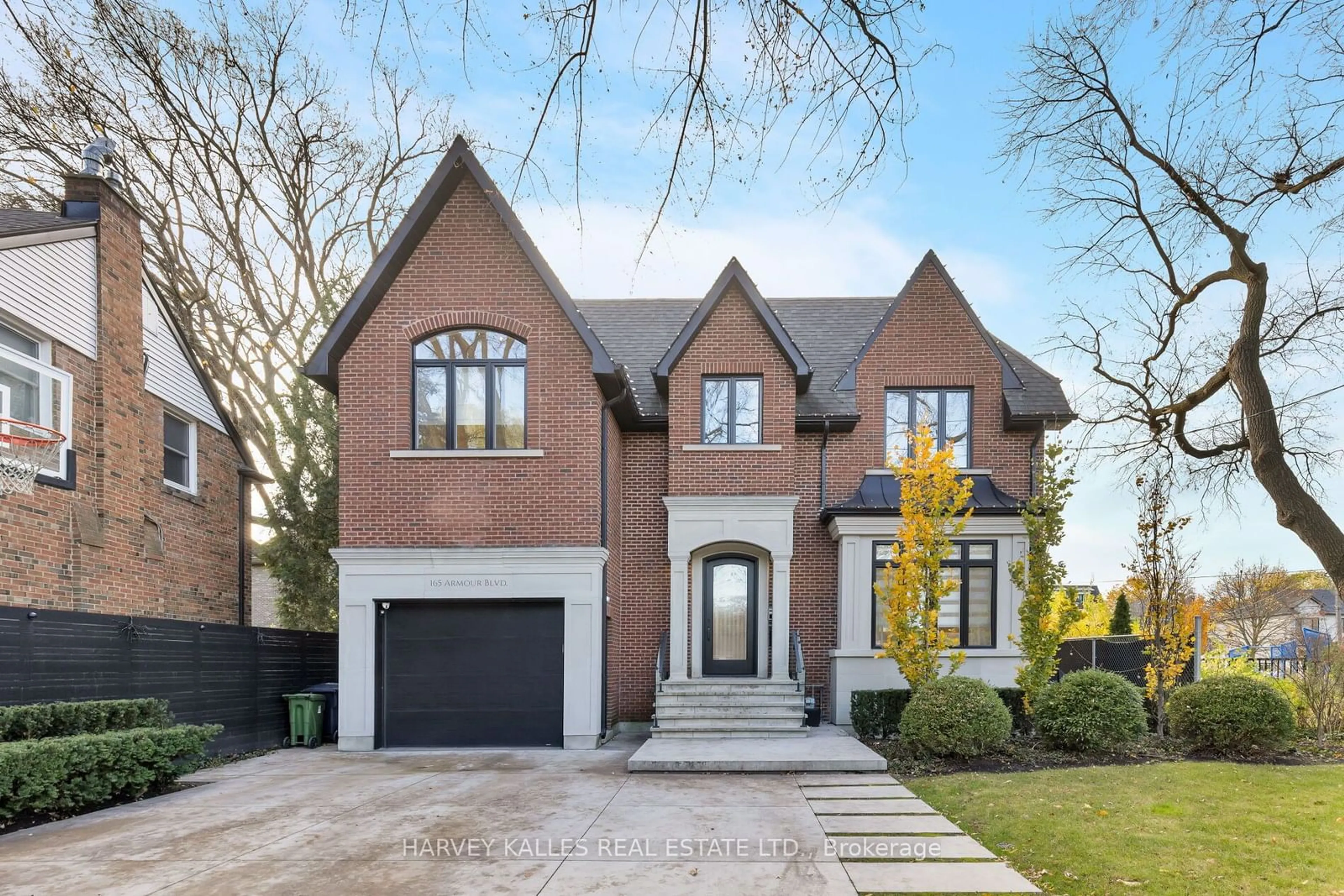 Home with brick exterior material for 165 Armour Blvd, Toronto Ontario M3H 1M1