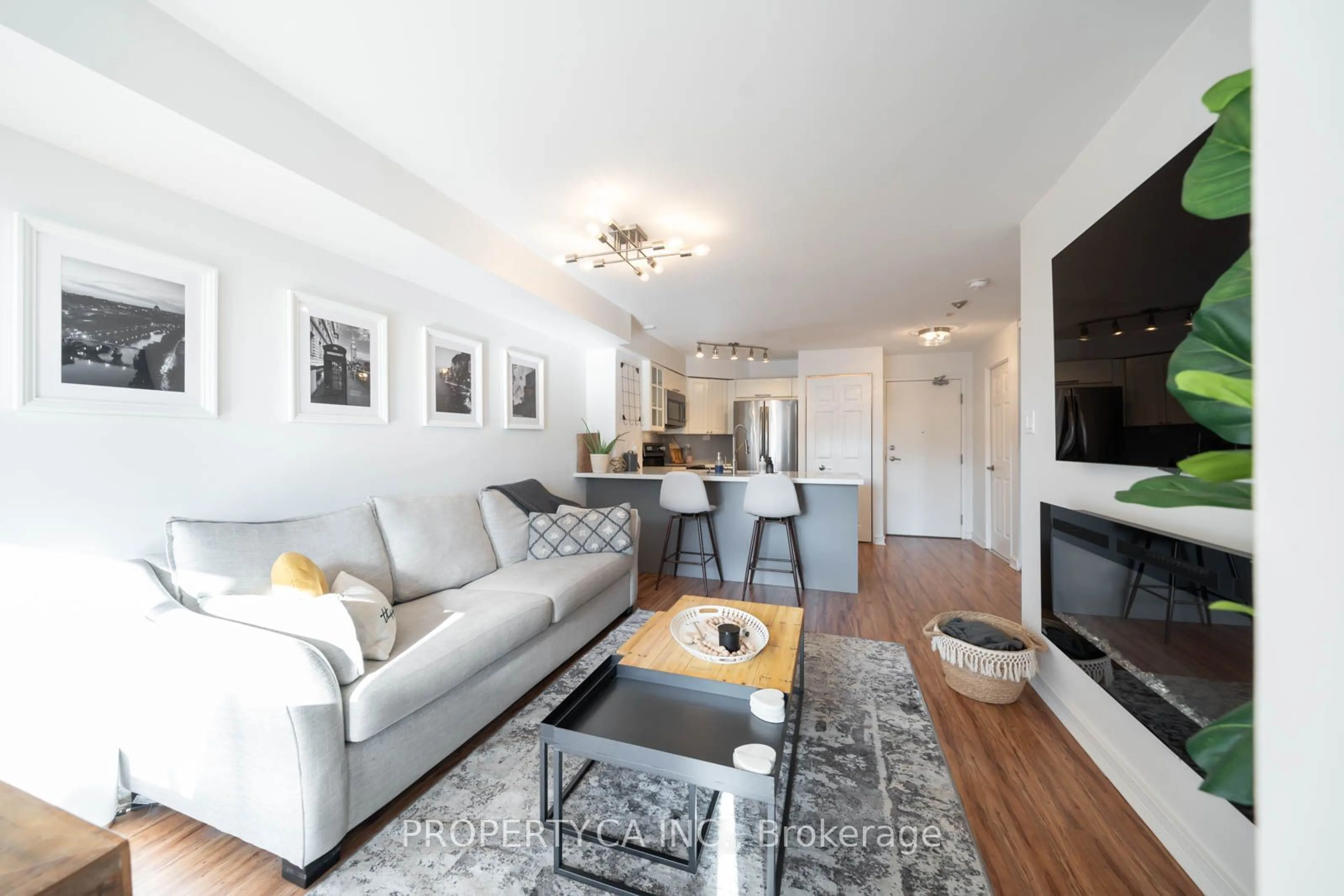 Living room, wood floors for 801 King St #408, Toronto Ontario M5V 3C9