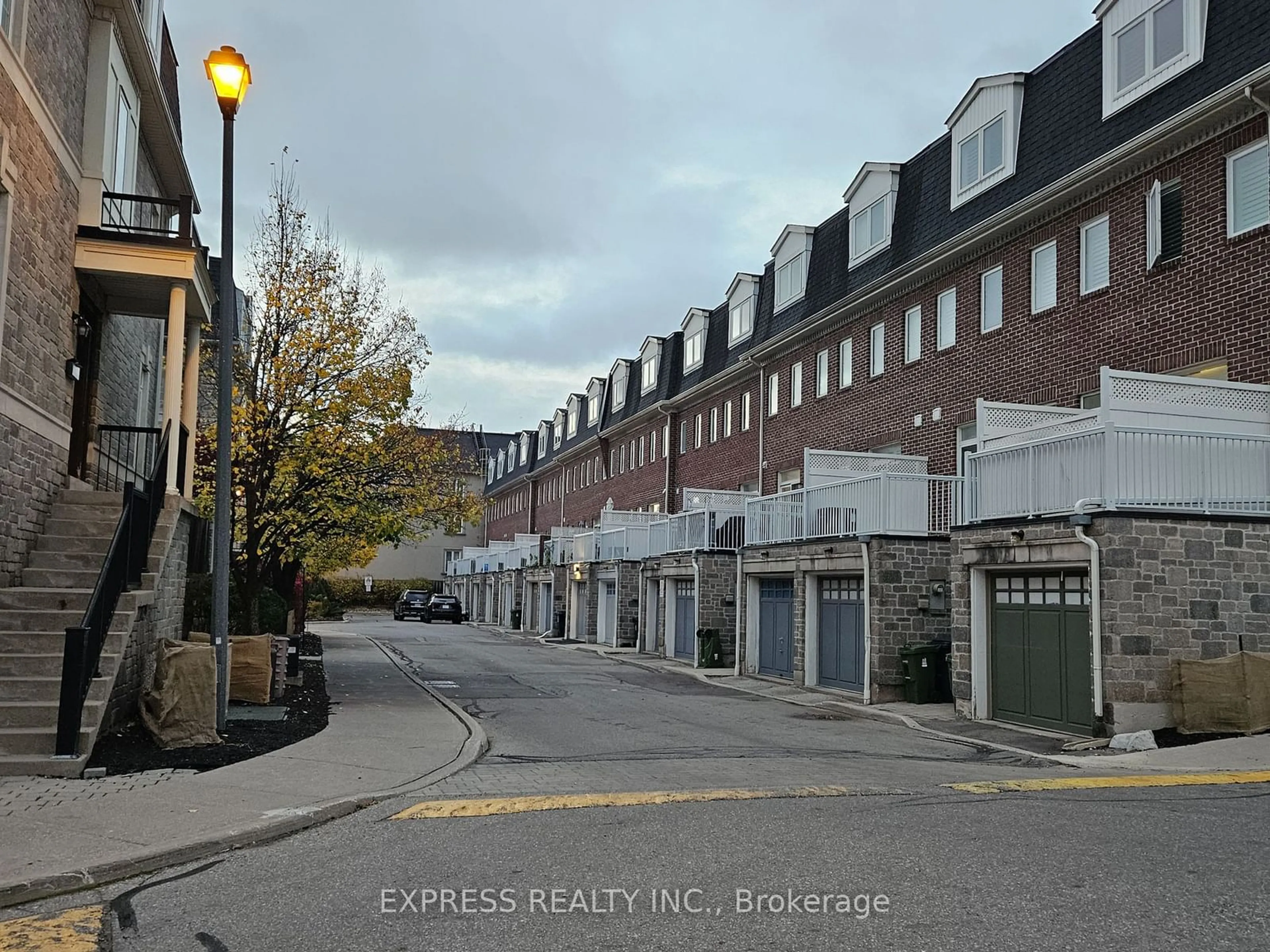 A pic from exterior of the house or condo, the street view for 12 Routliffe Lane, Toronto Ontario M2N 0A5