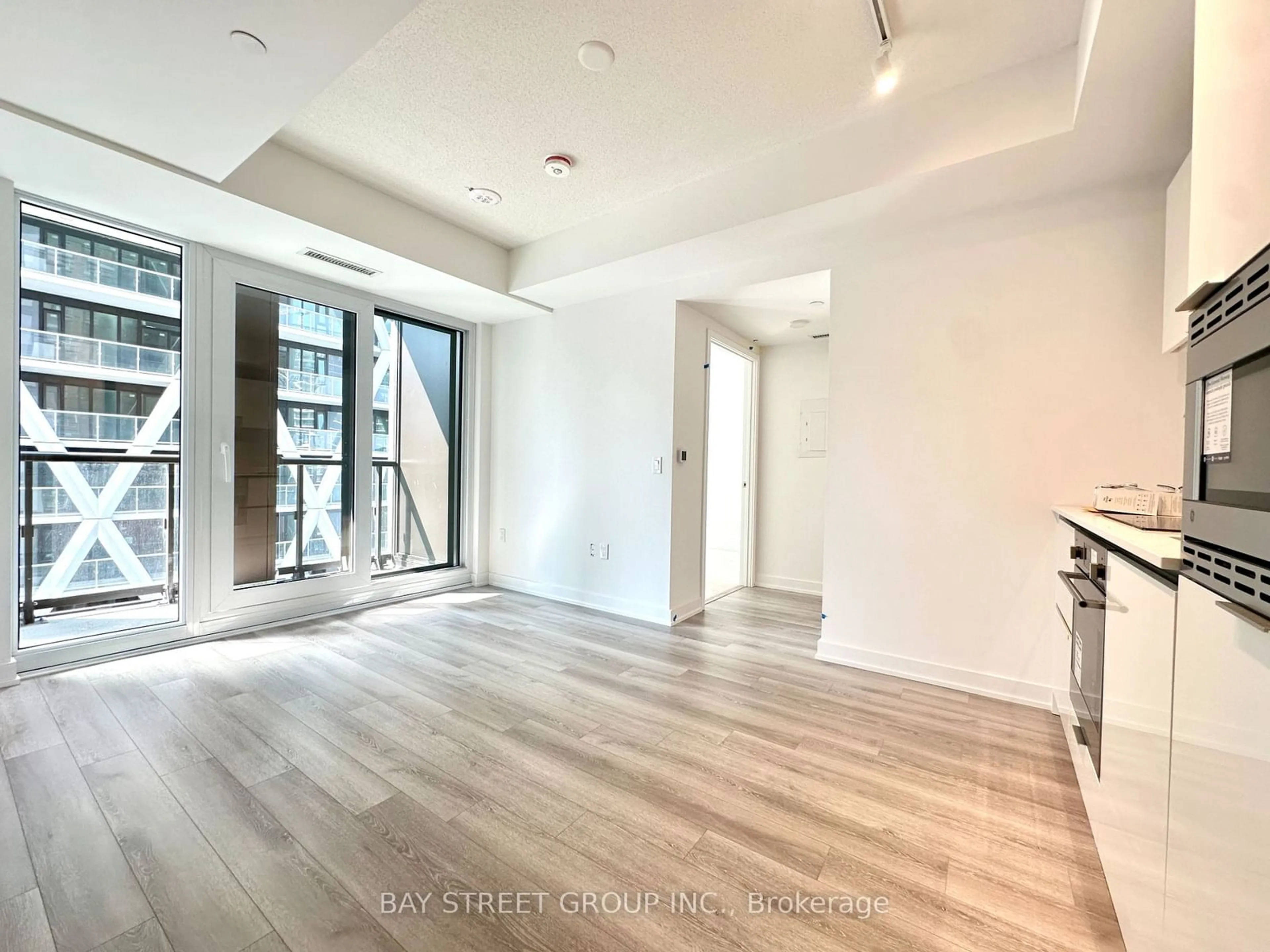 A pic of a room, wood floors for 238 Simcoe St #2006, Toronto Ontario M5T 1T4