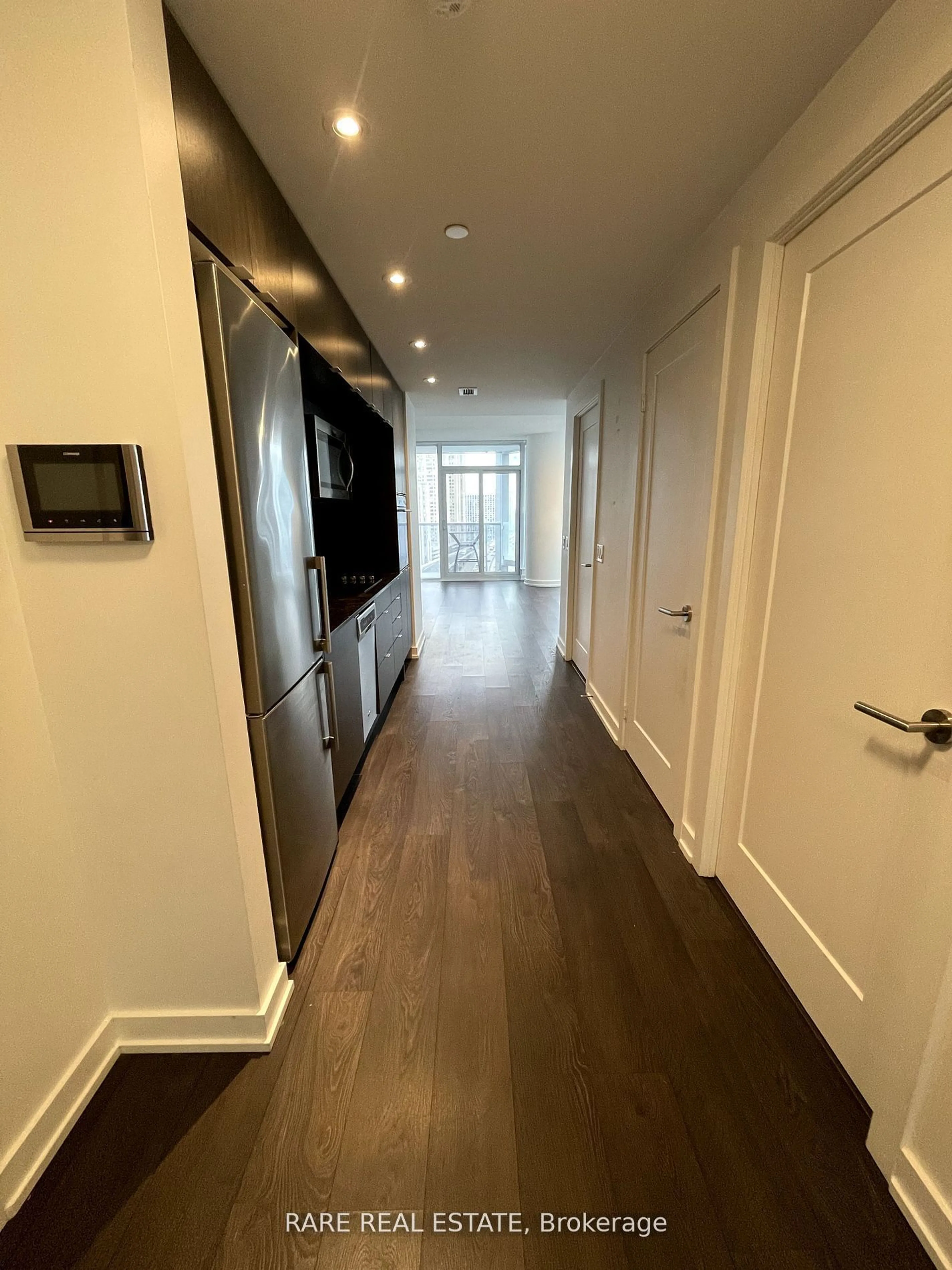 A pic of a room, wood floors for 10 York St #1311, Toronto Ontario M5J 0E1