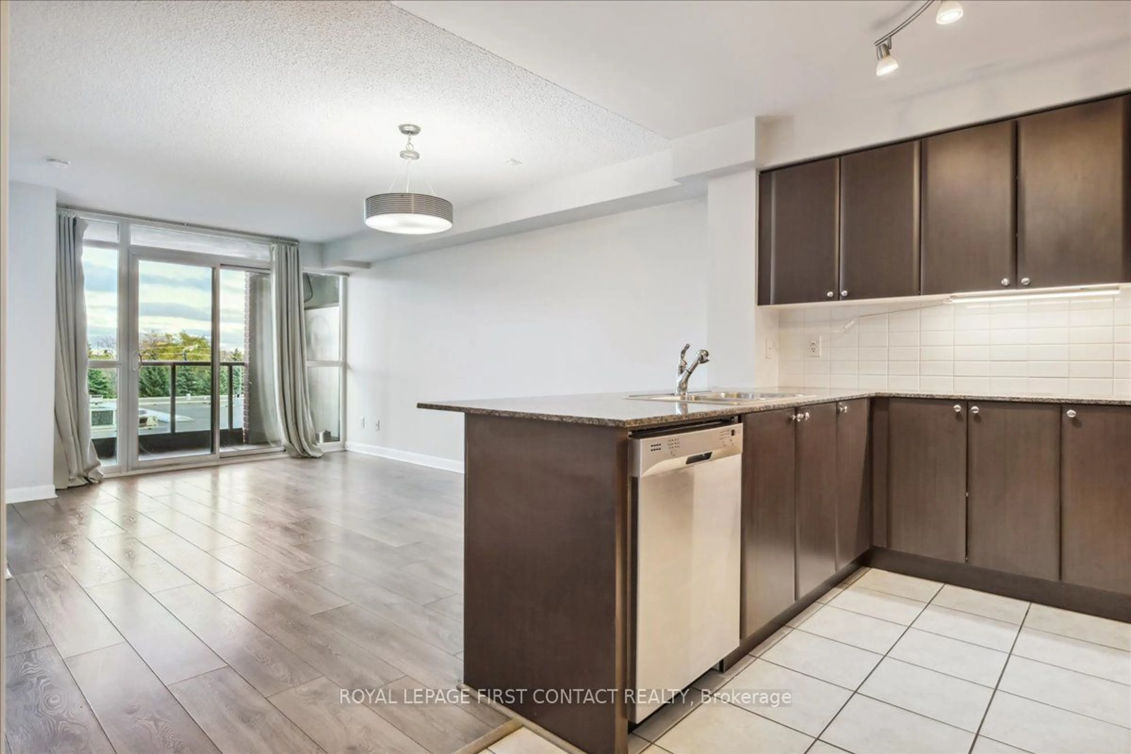 Open concept kitchen for 525 Wilson Ave #405, Toronto Ontario M3H 0A7