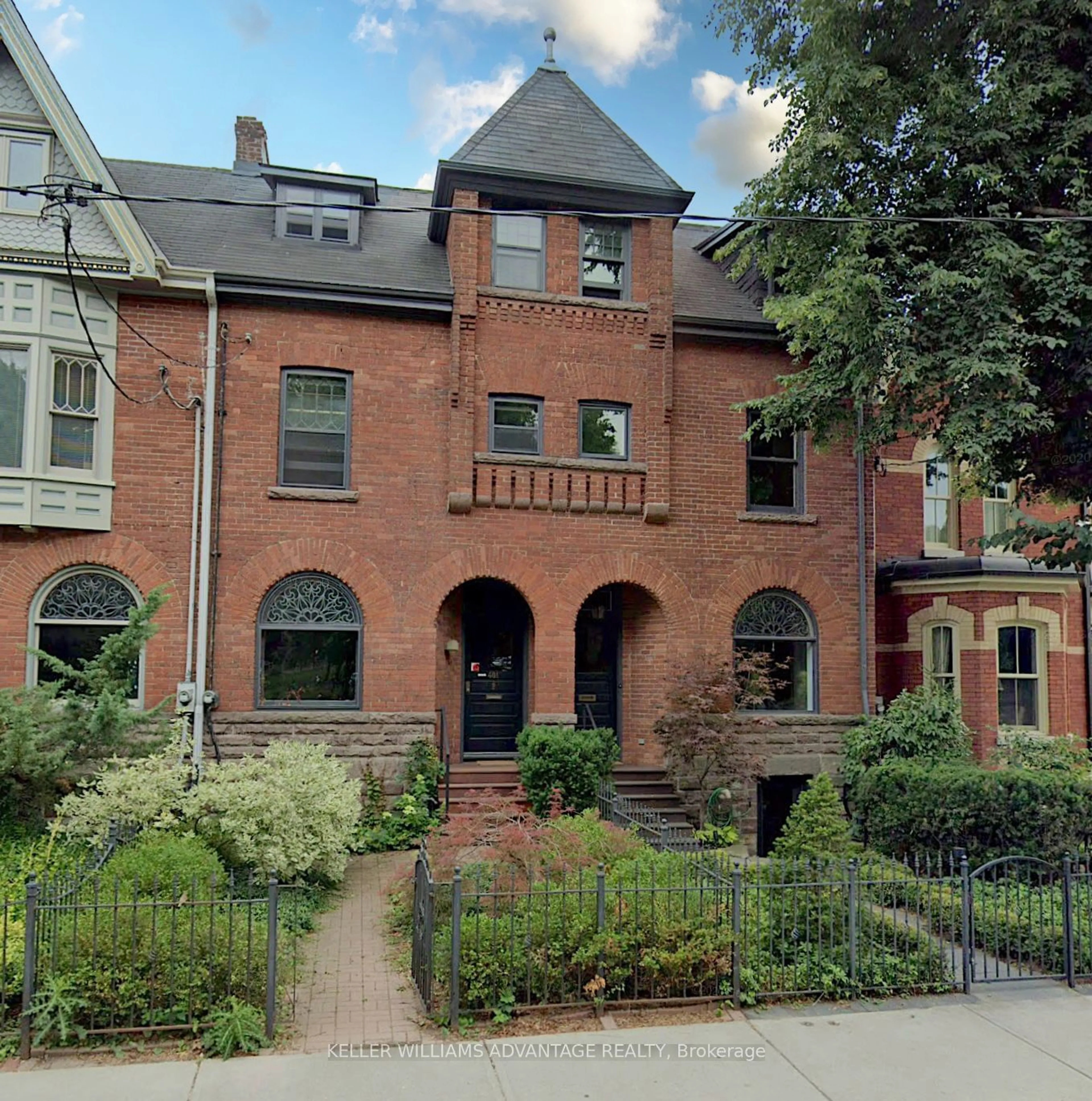 Home with brick exterior material for 401 Carlton St, Toronto Ontario M5A 2M3