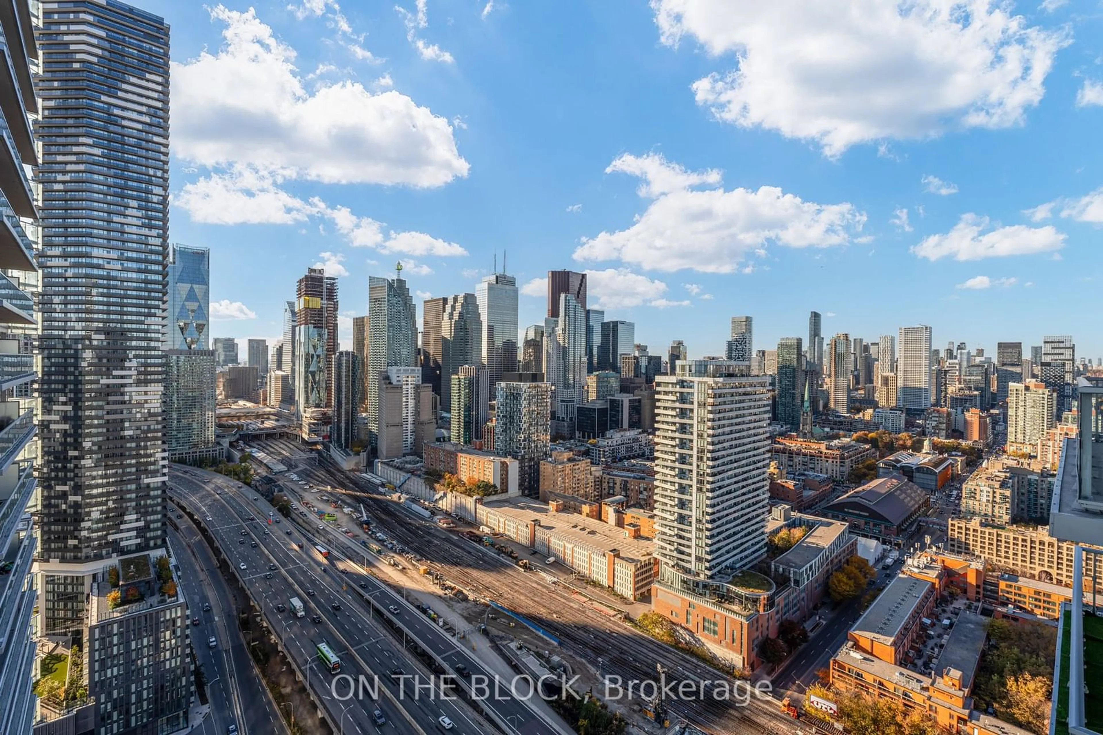 A pic from exterior of the house or condo, the view of city buildings for 20 Richardson St #3307, Toronto Ontario M5A 0S6