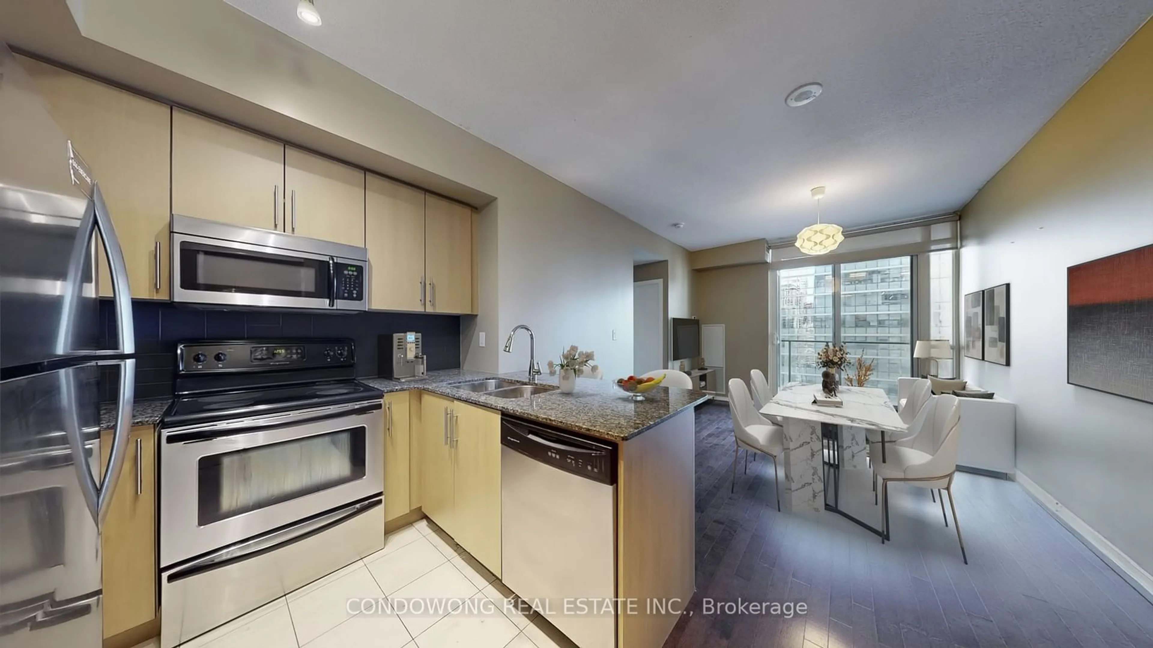 Open concept kitchen for 65 Bremner Blvd #3402, Toronto Ontario M5J 0A7