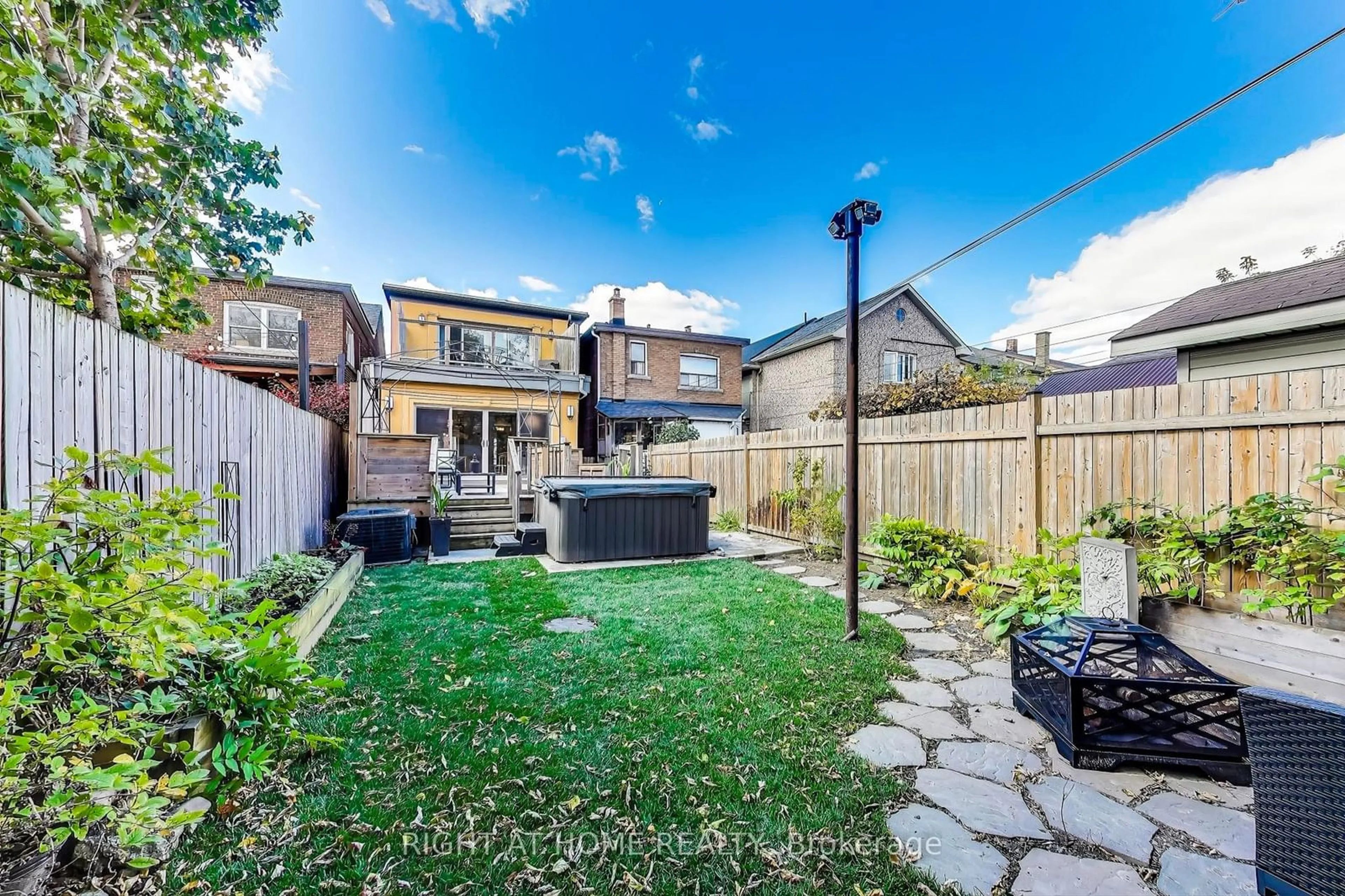 Patio, the fenced backyard for 225 Lauder Ave, Toronto Ontario M6E 3H5