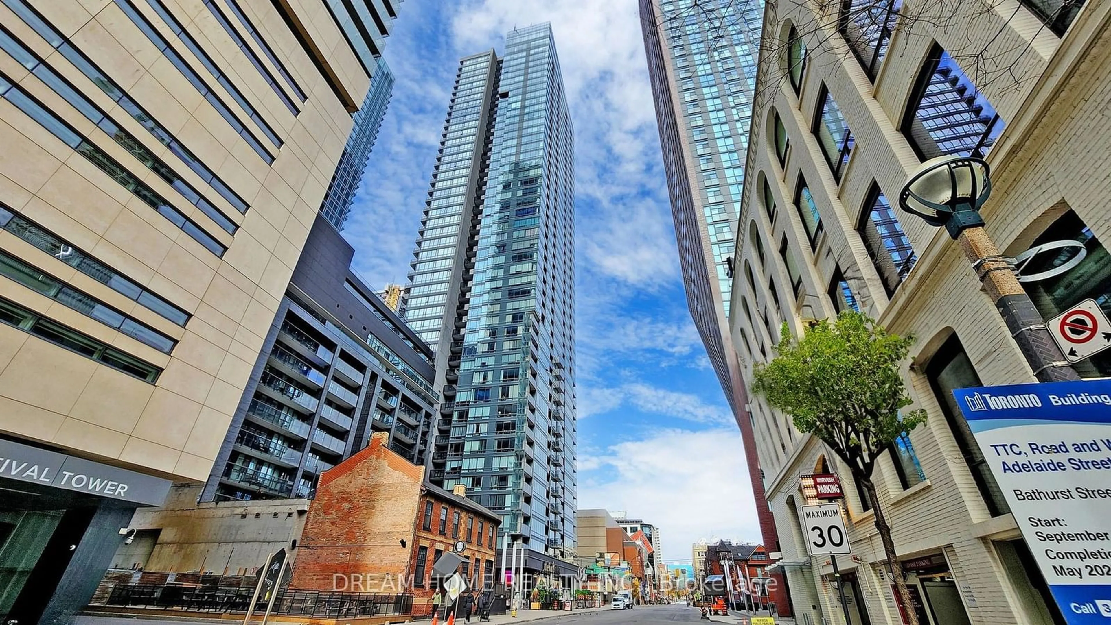 A pic from exterior of the house or condo, the view of city buildings for 295 Adelaide St #1505, Toronto Ontario M5V 1P7