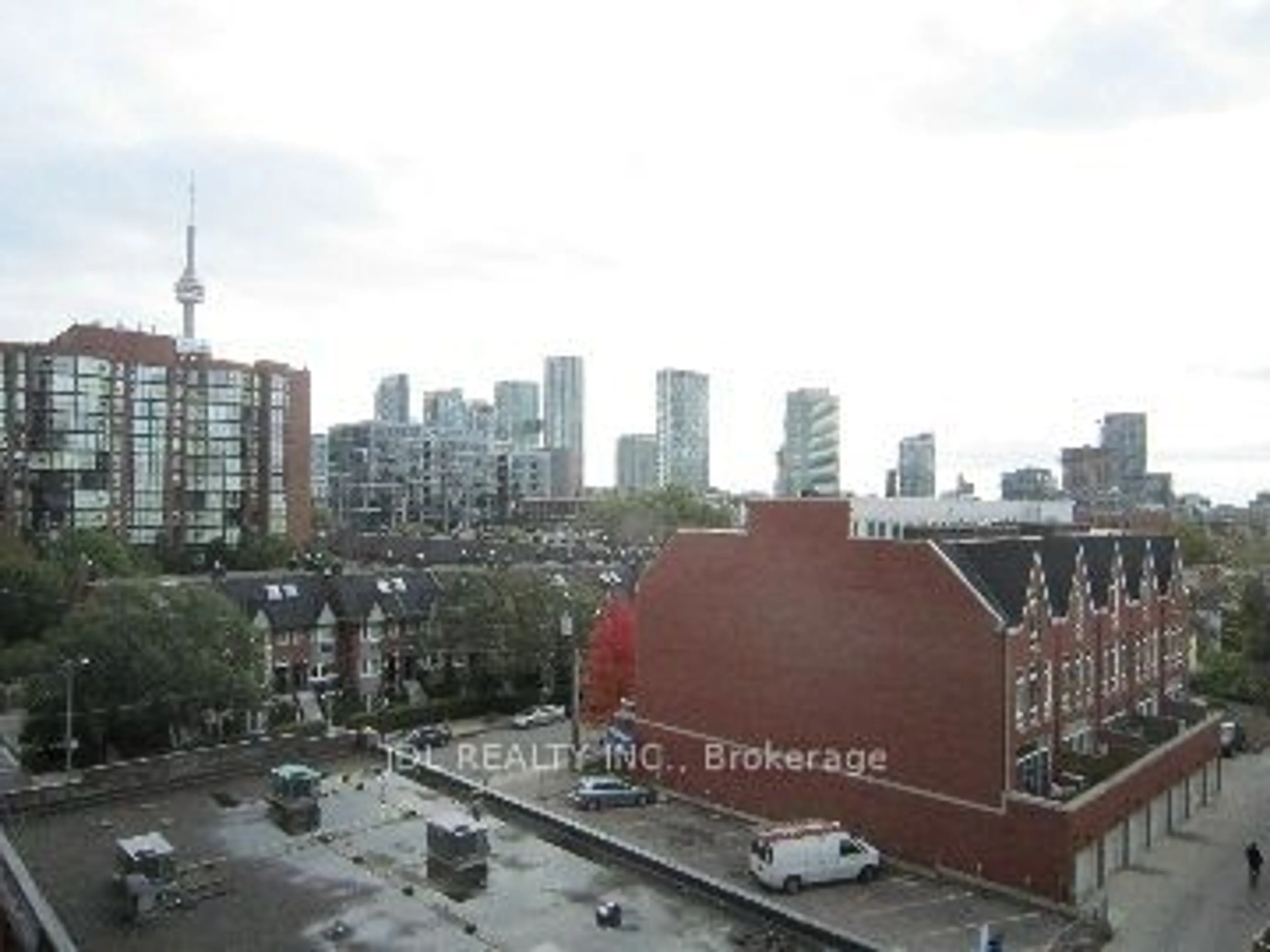 A pic from exterior of the house or condo, the view of city buildings for 775 King St #521, Toronto Ontario M5V 1C9