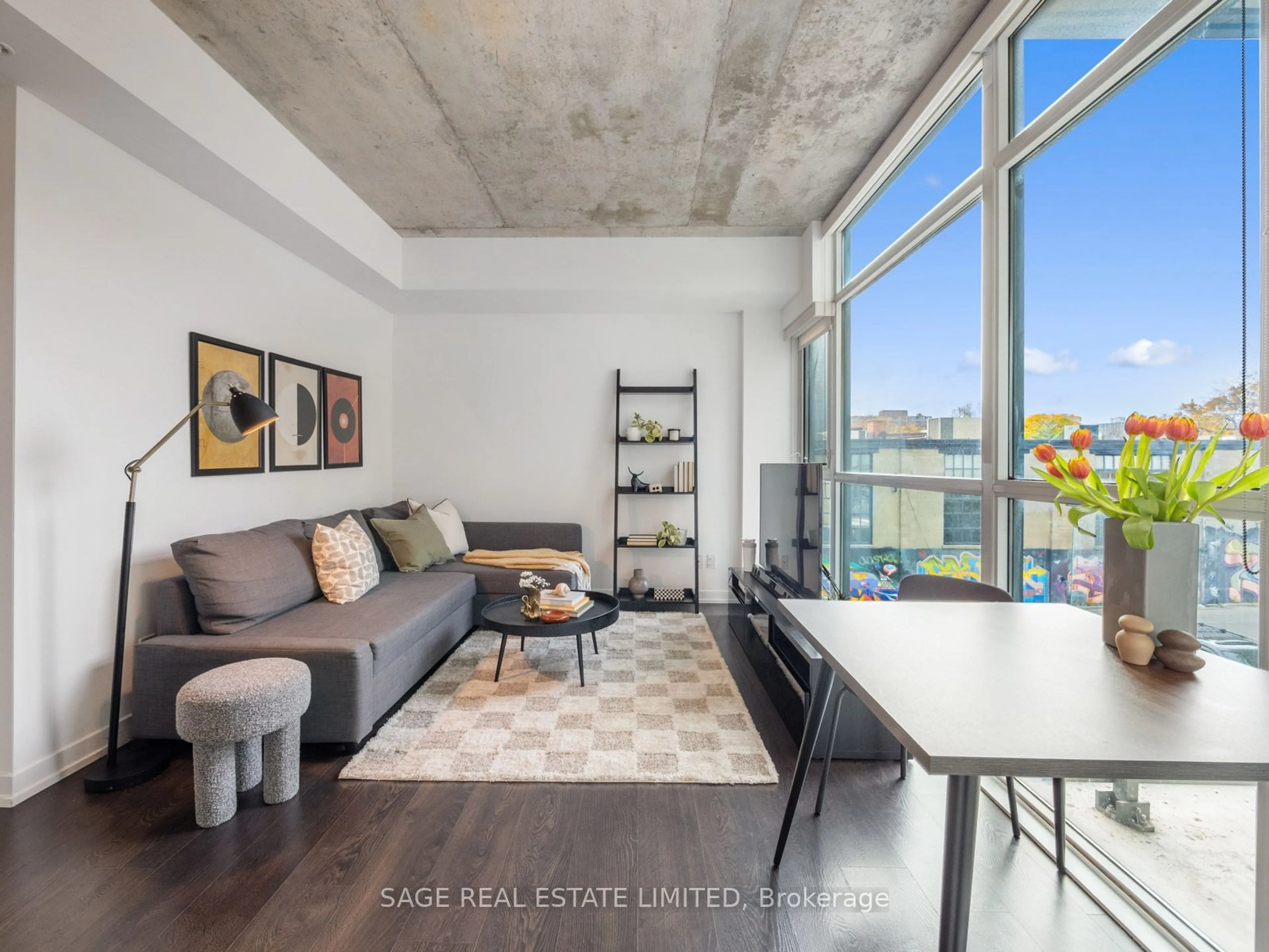 Living room, cement floor for 1205 Queen St #301, Toronto Ontario M6K 1L2