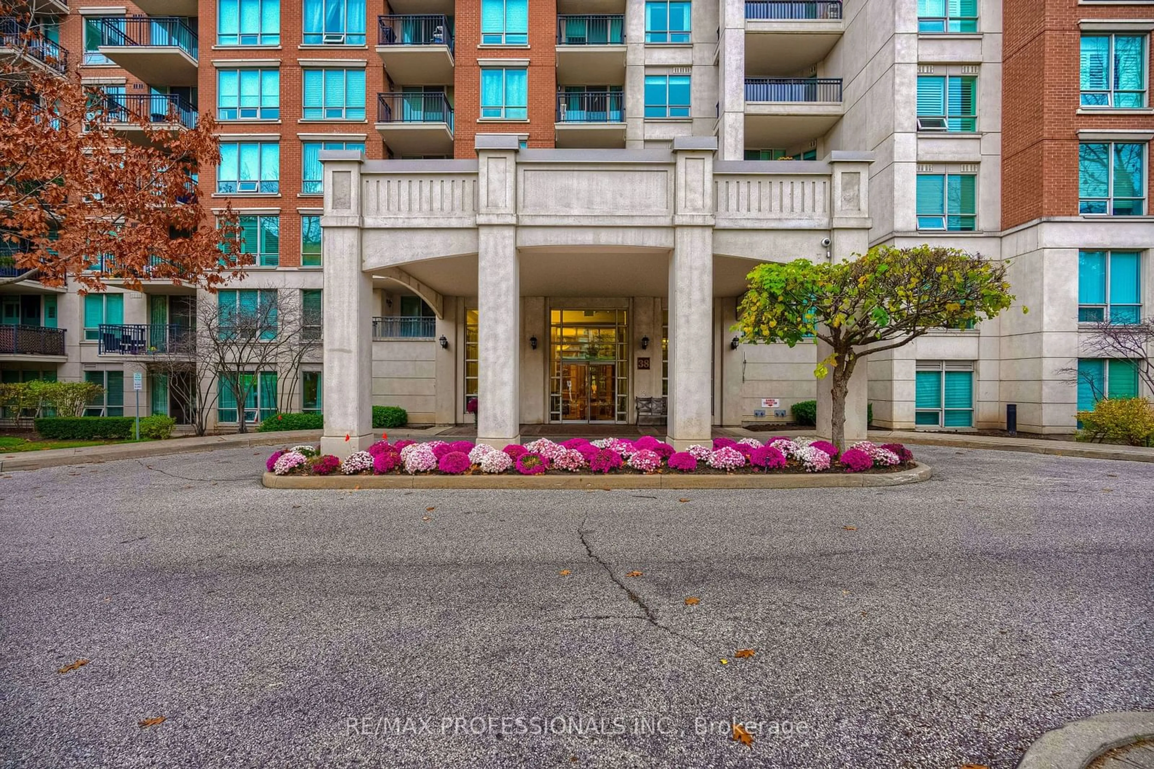 A pic from exterior of the house or condo, the street view for 38 William Carson Cres #104, Toronto Ontario M2P 2H2