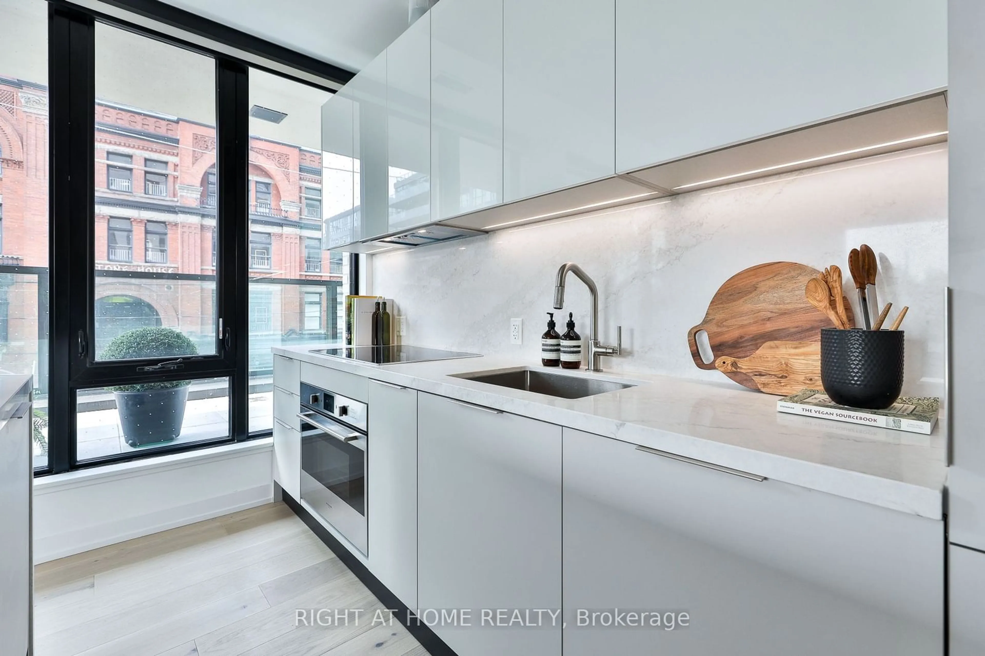 Contemporary kitchen, wood floors for 200 SUDBURY St #207, Toronto Ontario M6J 0H1